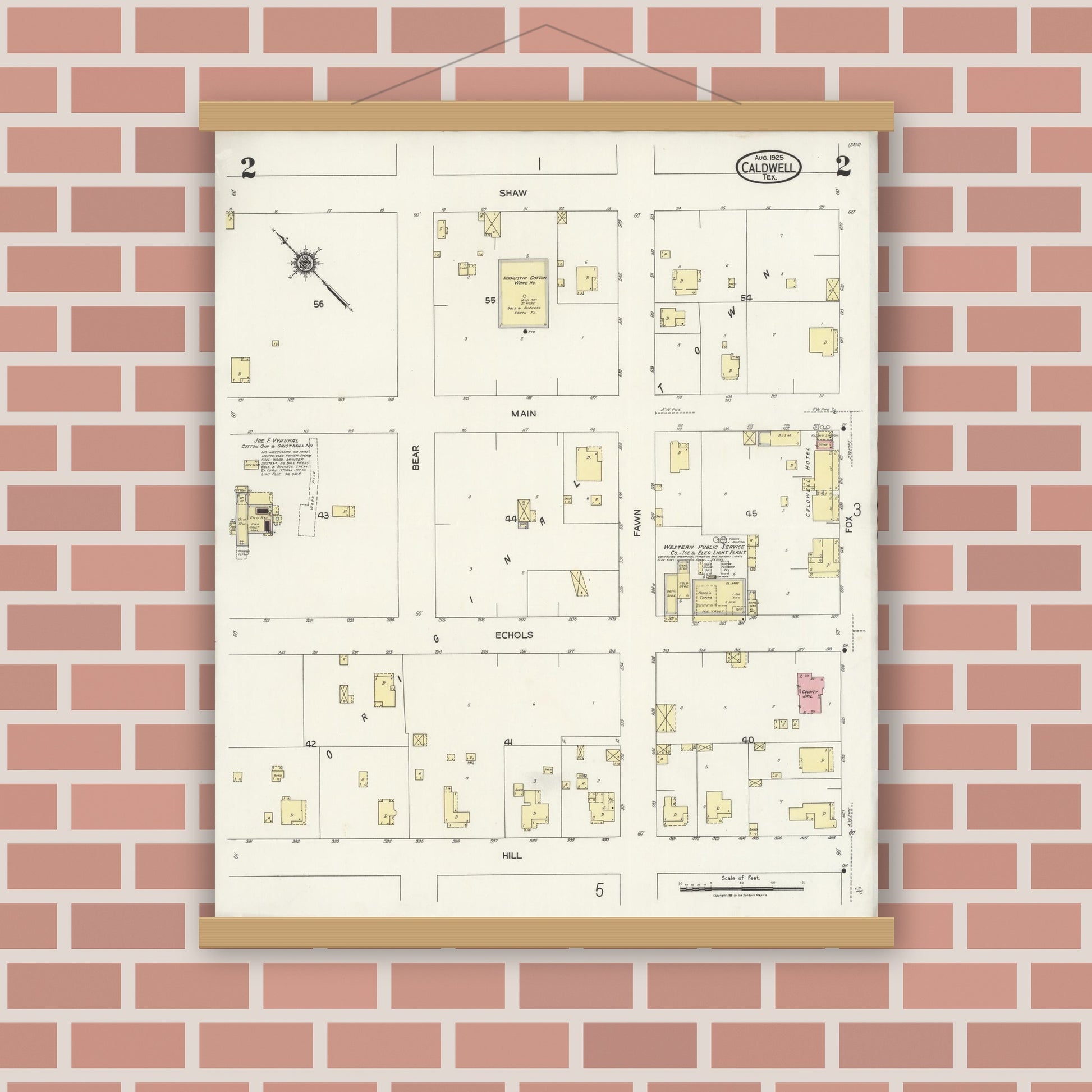 Old map wall art mockup — magnetic wood frame on brick wall — Sanborn Fire Insurance Map from Caldwell, Burleson County, Texas (1925), Sheet #0002