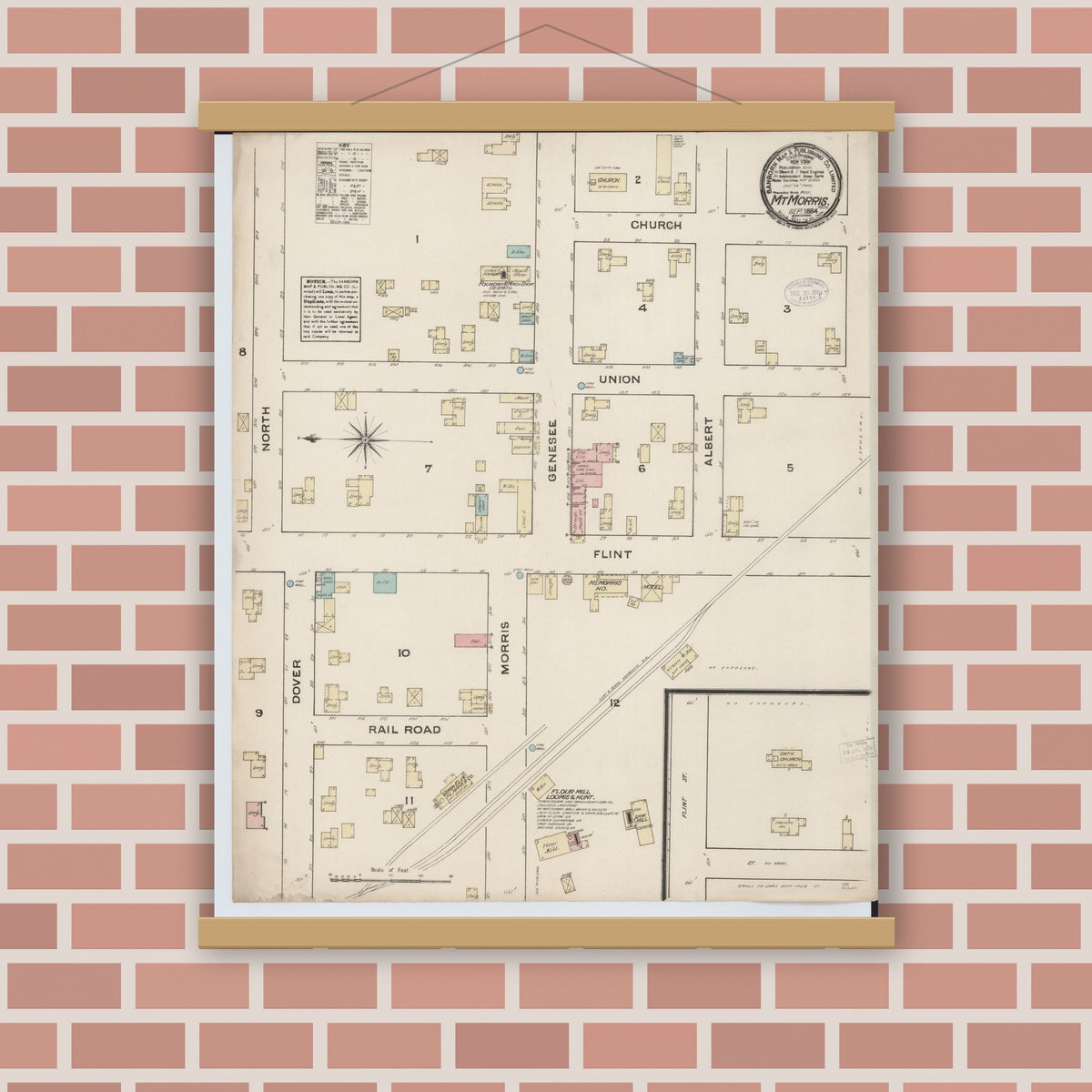 Old map wall art mockup — magnetic wood frame on brick wall — Sanborn Fire Insurance Map from Mount Morris, Genesee County, Michigan (1884), Sheet #0001