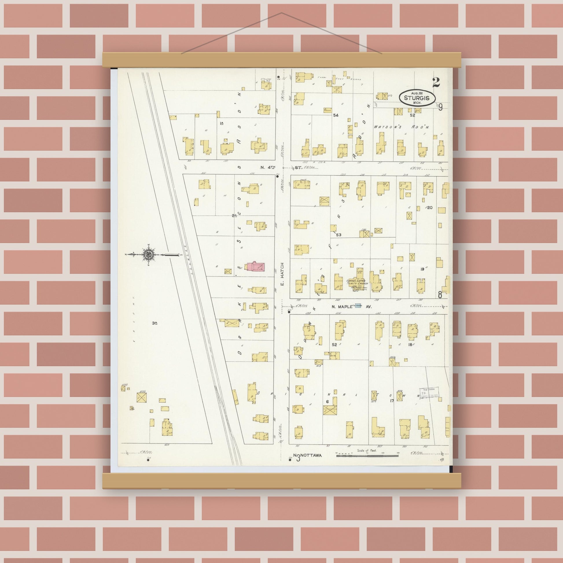 Old map wall art mockup — magnetic wood frame on brick wall — Sanborn Fire Insurance Map from Sturgis, Saint Joseph County, Michigan (1911), Sheet #0002