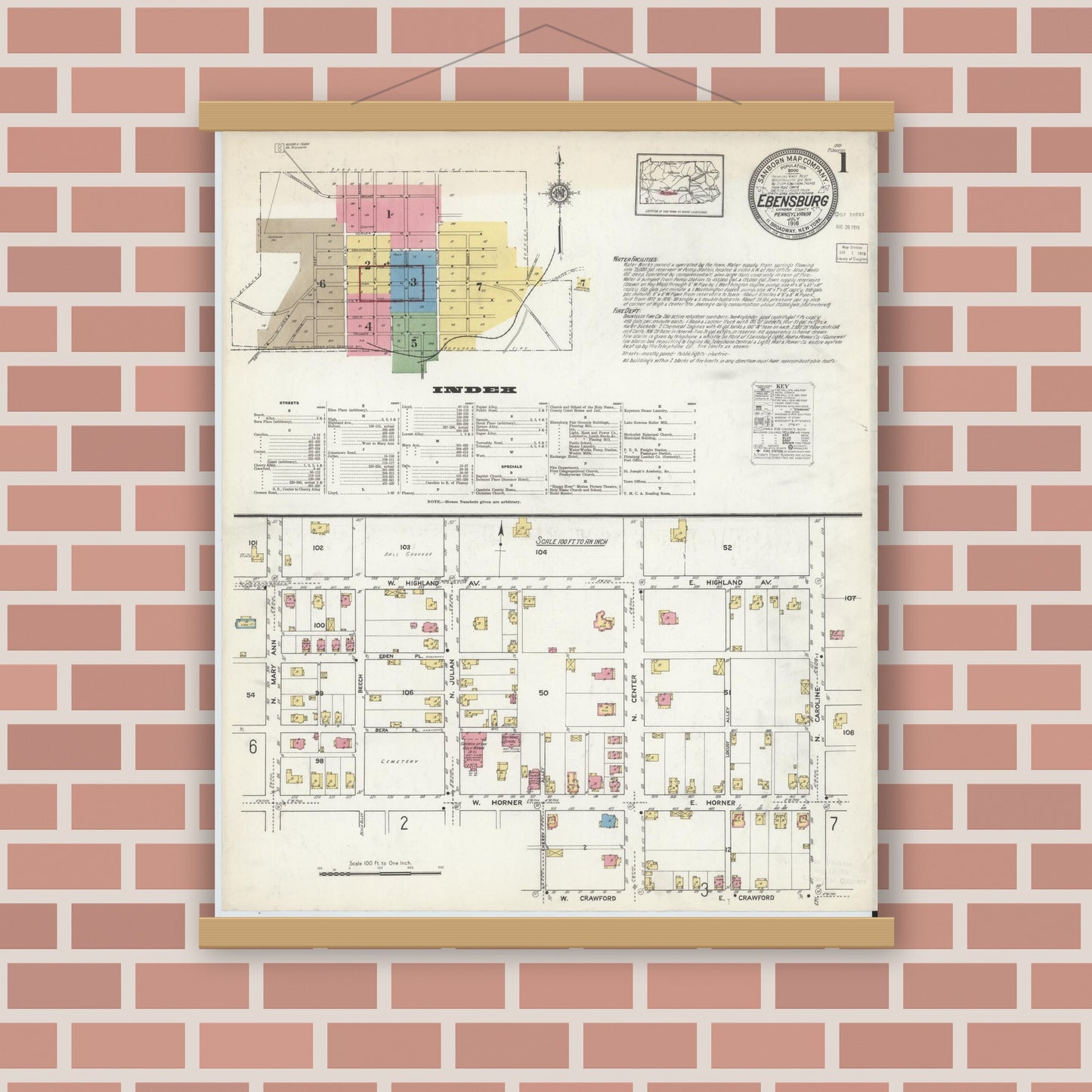 Old map wall art mockup — magnetic wood frame on brick wall — Sanborn Fire Insurance Map from Ebensburg, Cambria County, Pennsylvania (1916), Sheet #0001