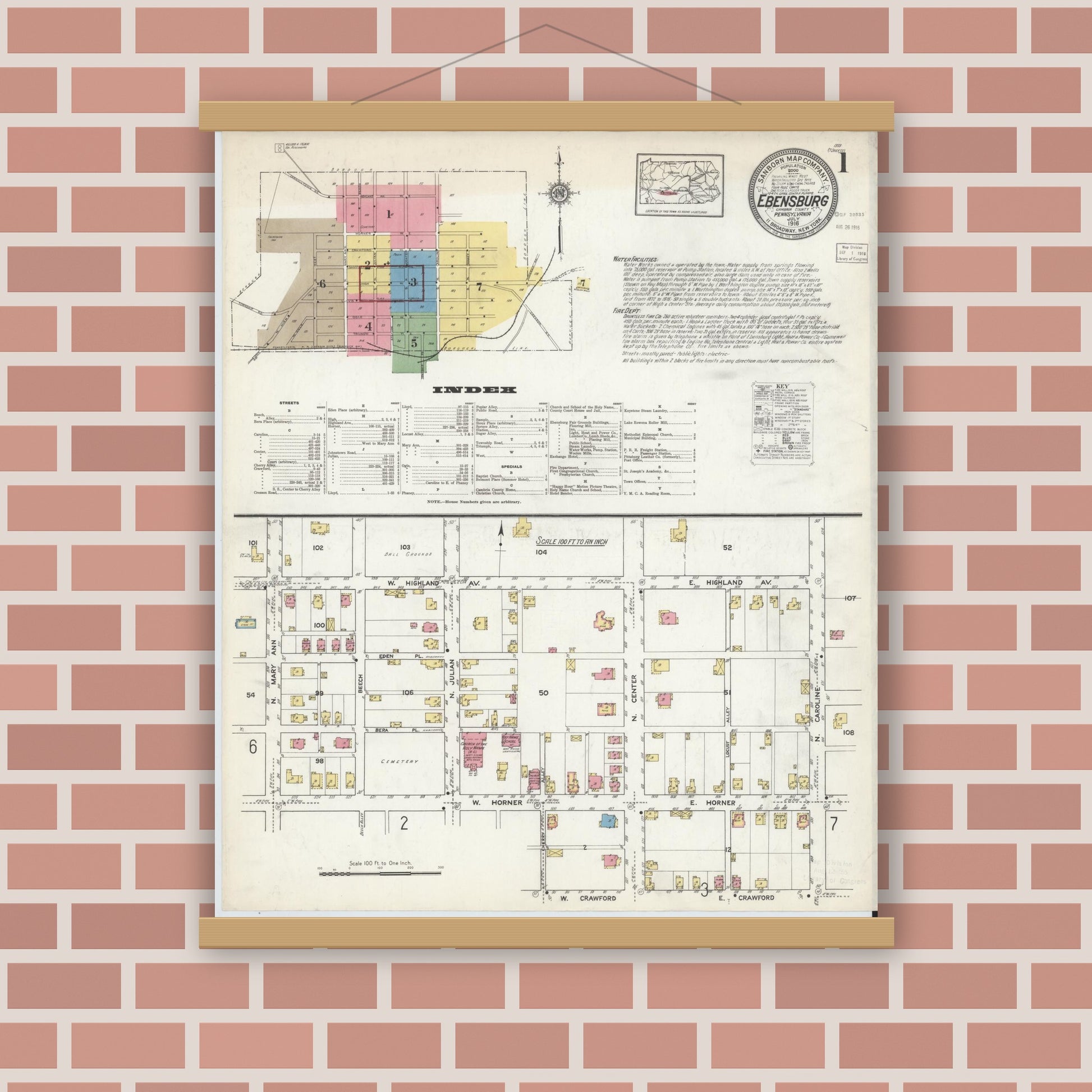 Old map wall art mockup — magnetic wood frame on brick wall — Sanborn Fire Insurance Map from Ebensburg, Cambria County, Pennsylvania (1916), Sheet #0001