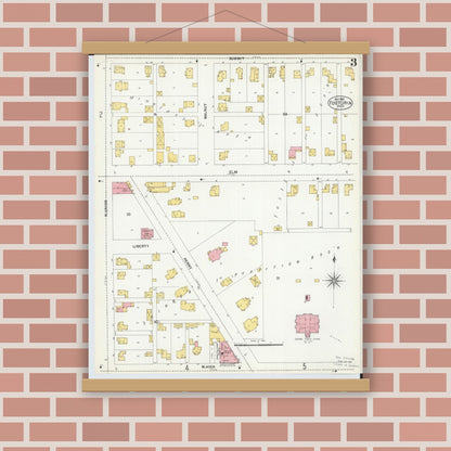 Old map wall art mockup — magnetic wood frame on brick wall — Sanborn Fire Insurance Map from Fostoria, Seneca, Hancock, And Wood Counties, Ohio (1901), Sheet #0003