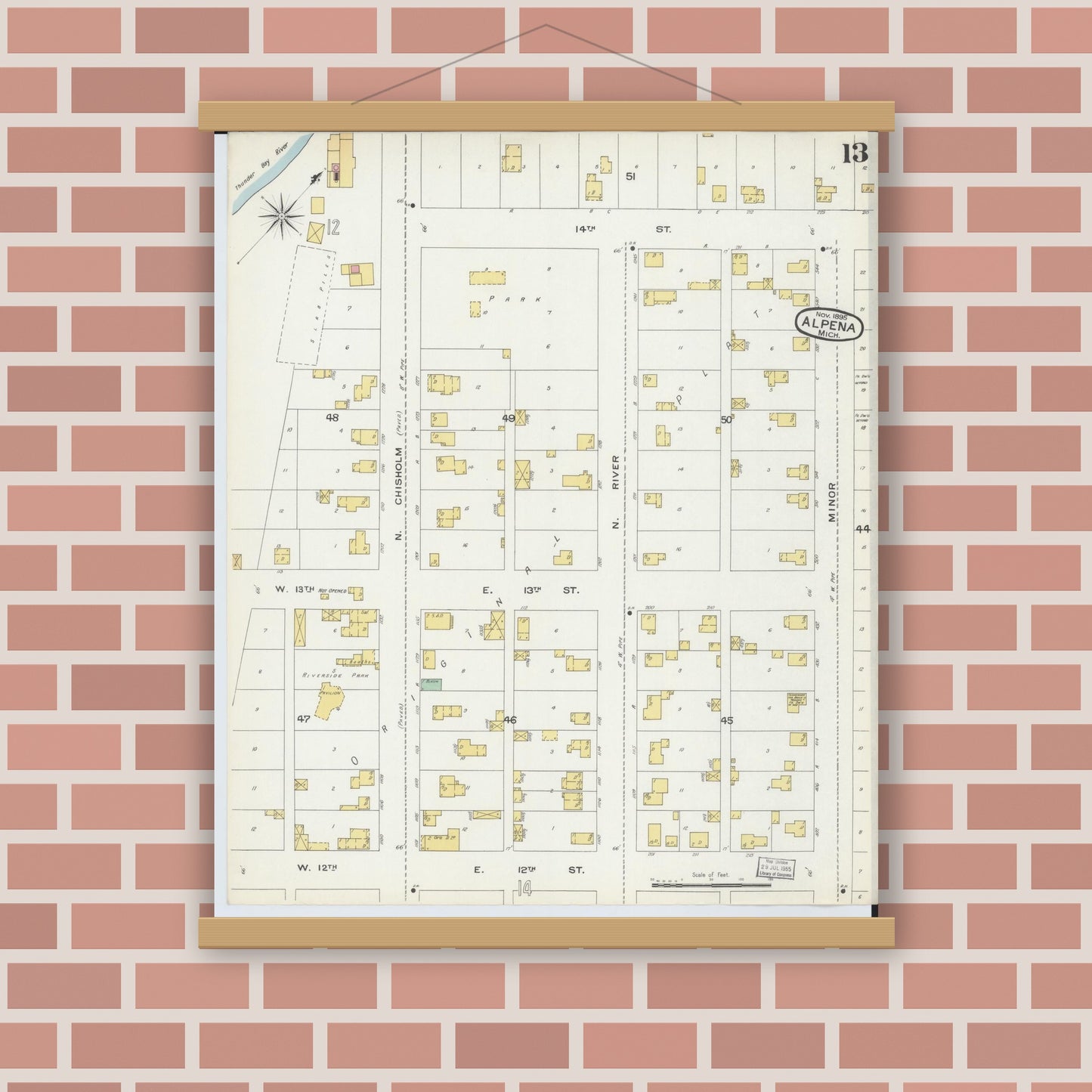 Old map wall art mockup — magnetic wood frame on brick wall — Sanborn Fire Insurance Map from Alpena, Alpena County, Michigan (1895), Sheet #0013