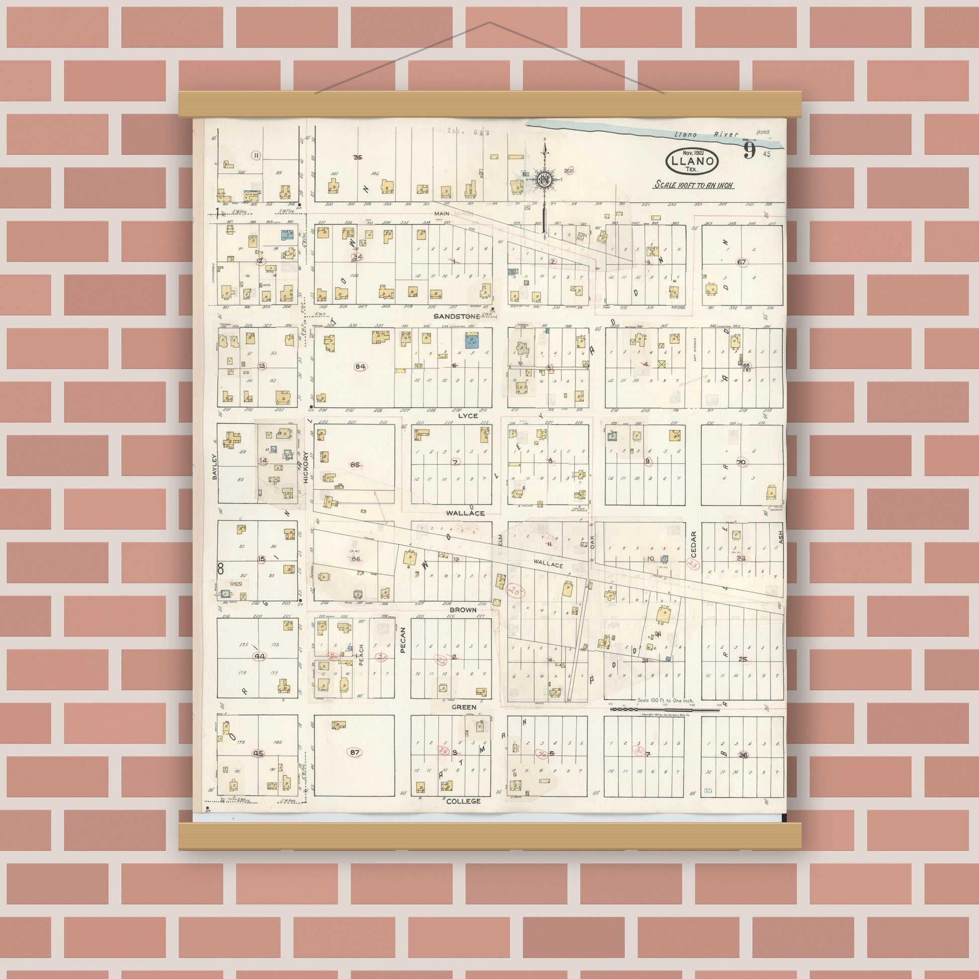 Old map wall art mockup — magnetic wood frame on brick wall — Sanborn Fire Insurance Map from Llano, Llano County, Texas (1942), Sheet #0009