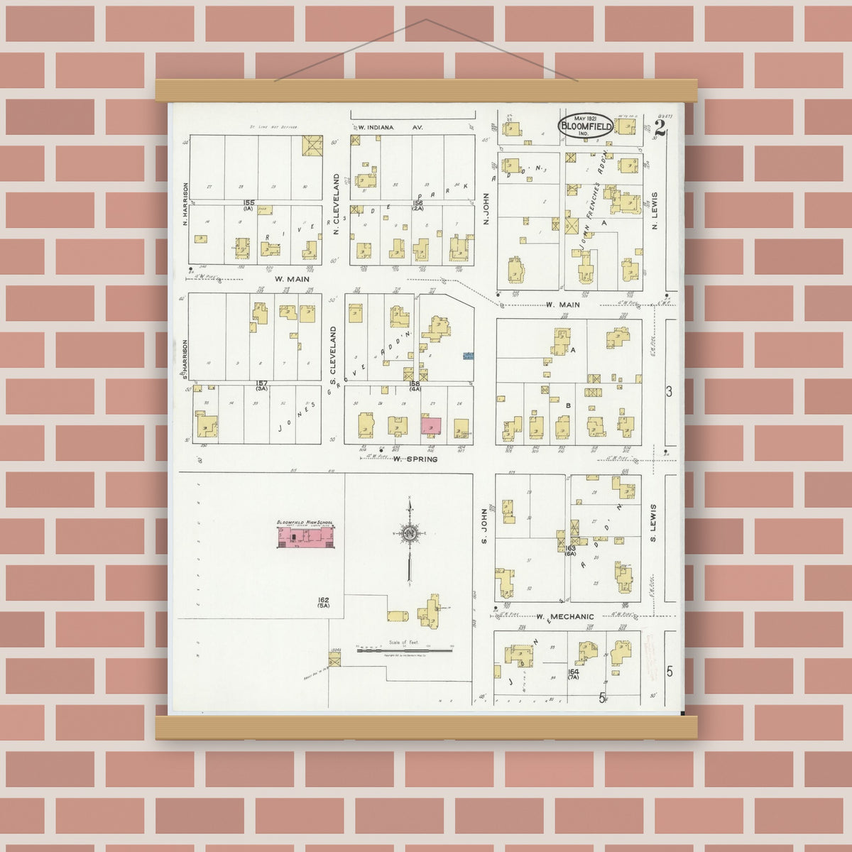 Old map wall art mockup — magnetic wood frame on brick wall — Sanborn Fire Insurance Map from Bloomfield, Greene County, Indiana (1921), Sheet #0002