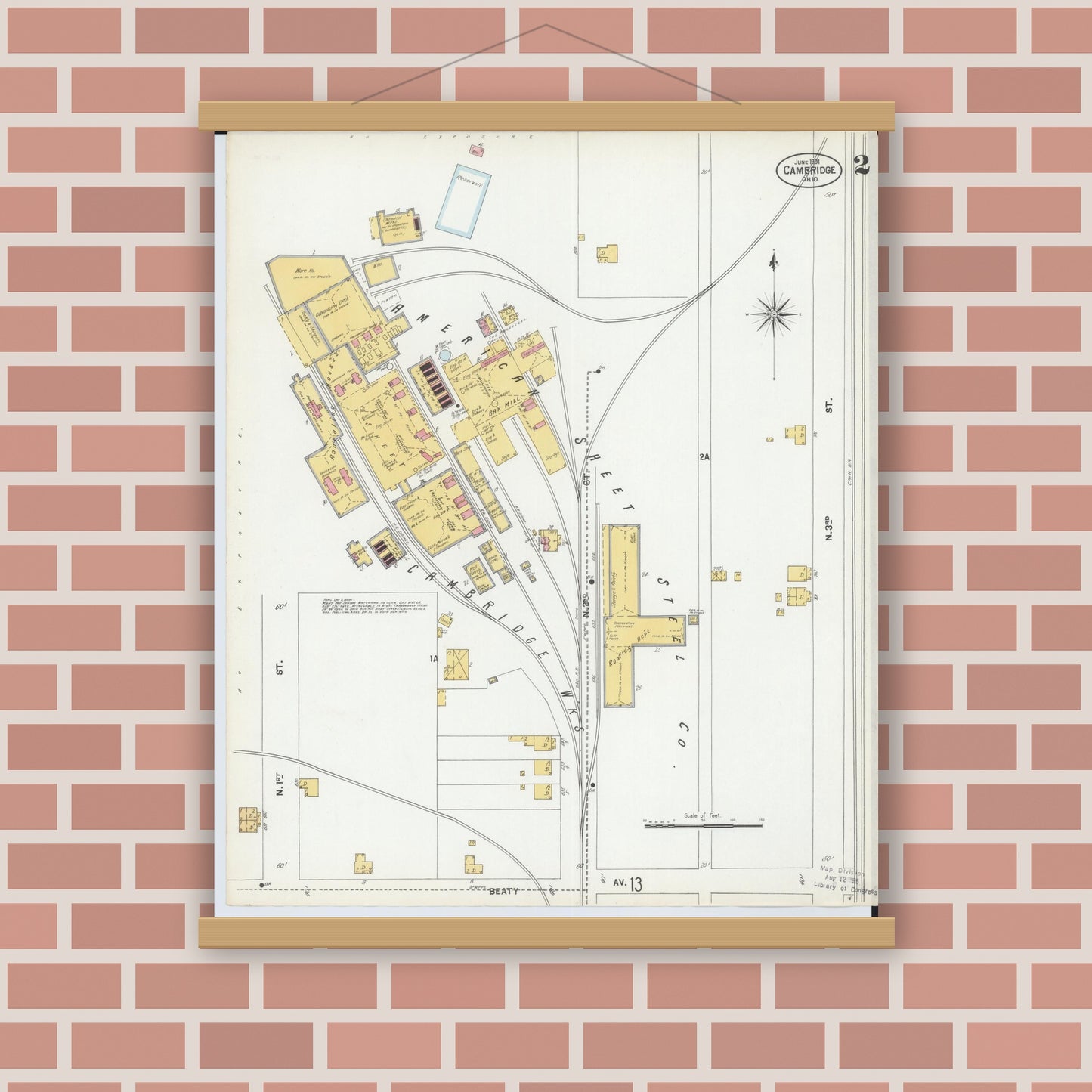 Old map wall art mockup — magnetic wood frame on brick wall — Sanborn Fire Insurance Map from Cambridge, Guernsey County, Ohio (1901), Sheet #0002