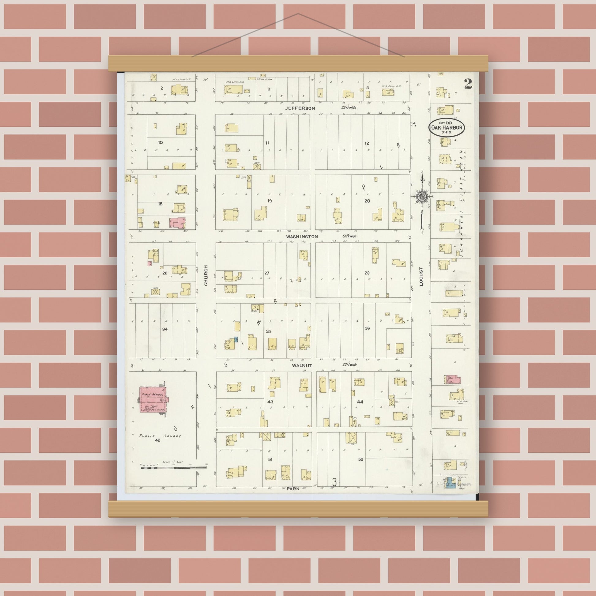 Old map wall art mockup — magnetic wood frame on brick wall — Sanborn Fire Insurance Map from Oak Harbor, Ottawa County, Ohio (1910), Sheet #0002