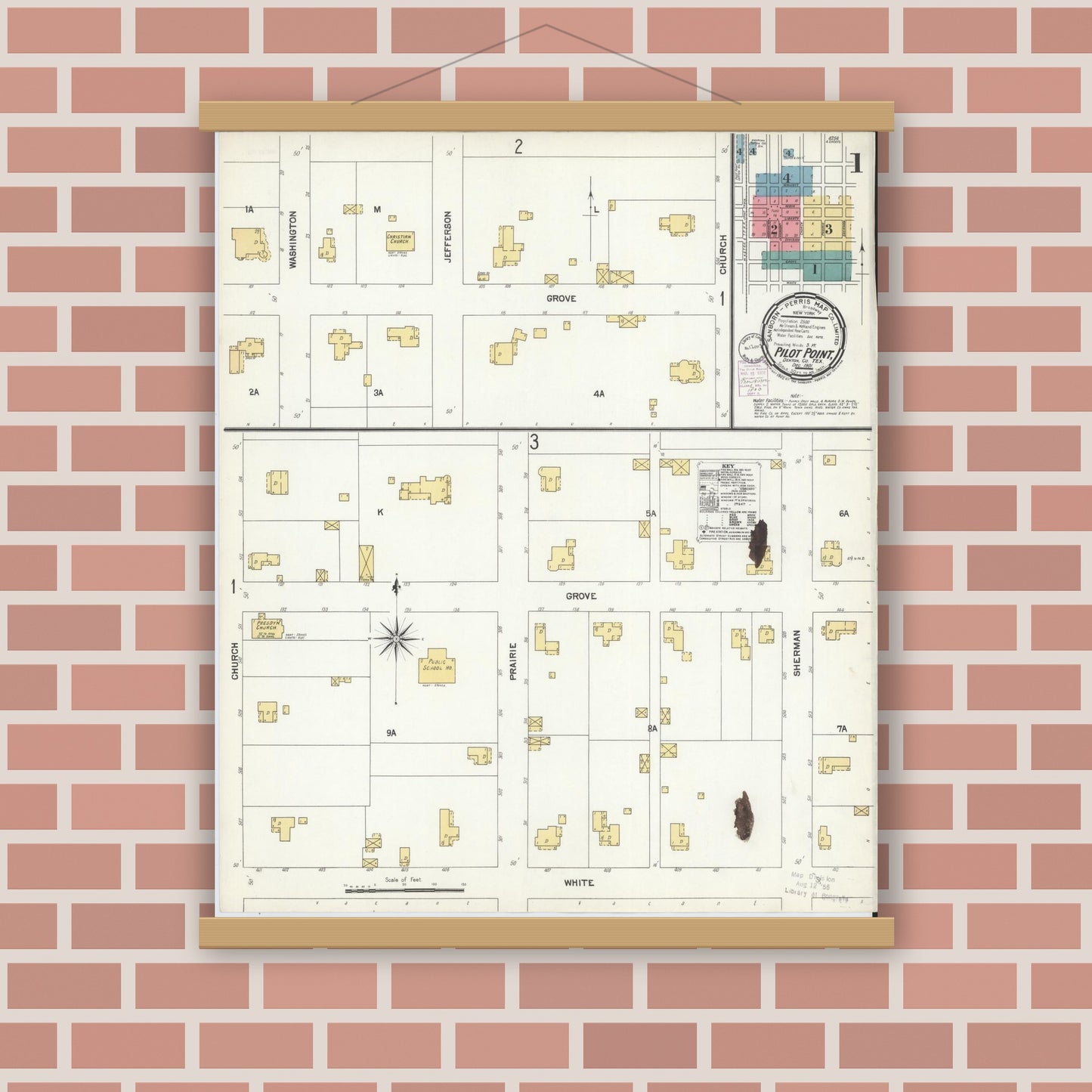 Old map wall art mockup — magnetic wood frame on brick wall — Sanborn Fire Insurance Map from Pilot Point, Denton County, Texas (1901), Sheet #0001