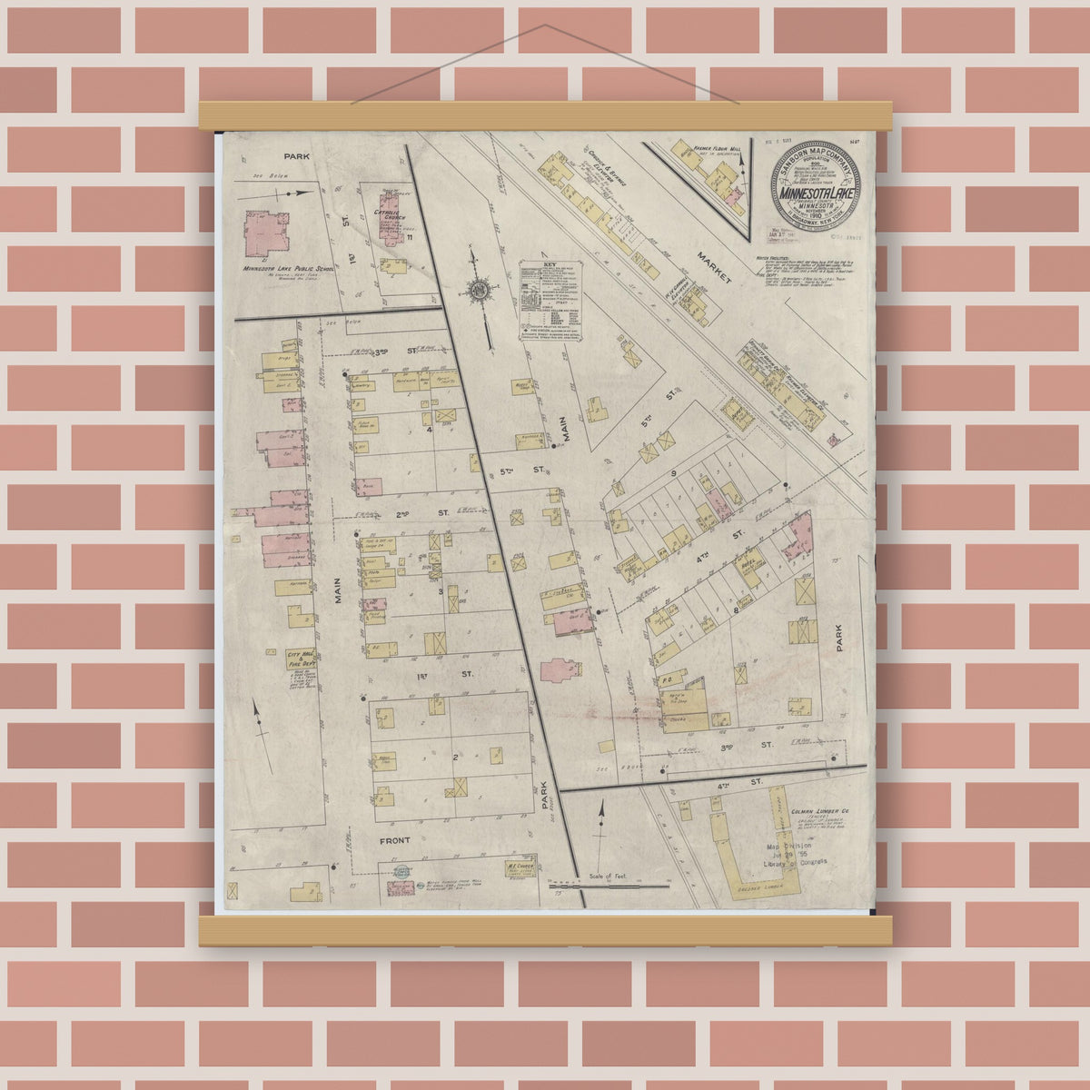 Old map wall art mockup — magnetic wood frame on brick wall — Sanborn Fire Insurance Map from Minnesota Lake, Faribault County, Minnesota (1910), Sheet #0001