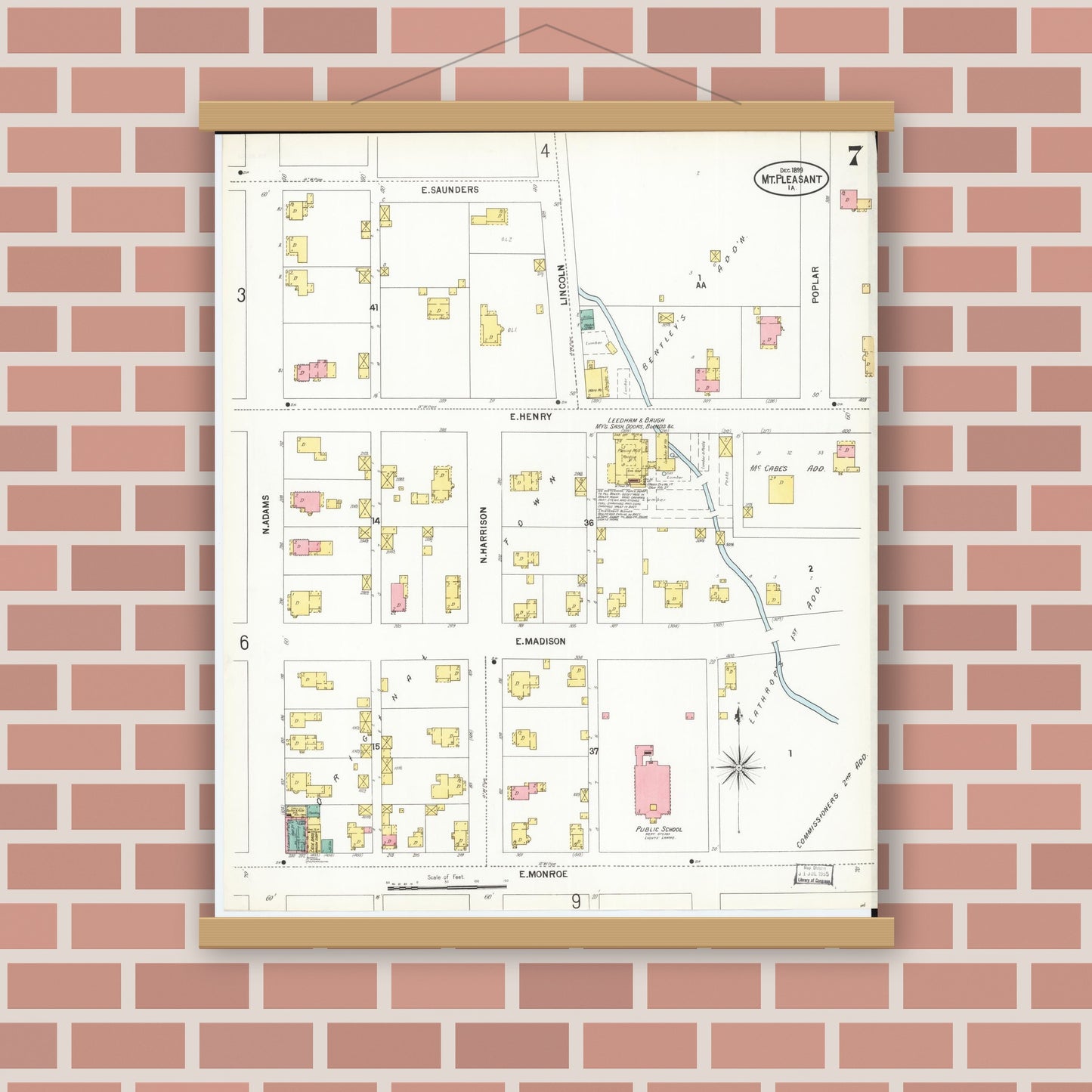 Old map wall art mockup — magnetic wood frame on brick wall — Sanborn Fire Insurance Map from Mount Pleasant, Henry County, Iowa (1899), Sheet #0007