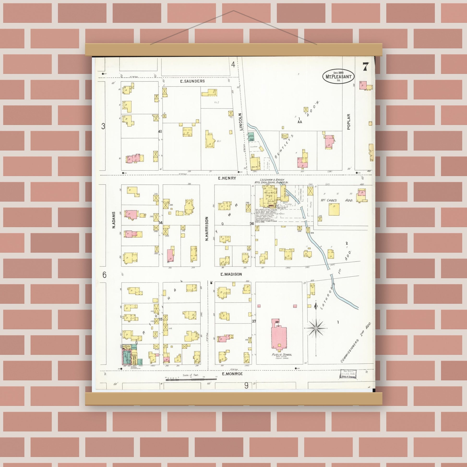 Old map wall art mockup — magnetic wood frame on brick wall — Sanborn Fire Insurance Map from Mount Pleasant, Henry County, Iowa (1899), Sheet #0007