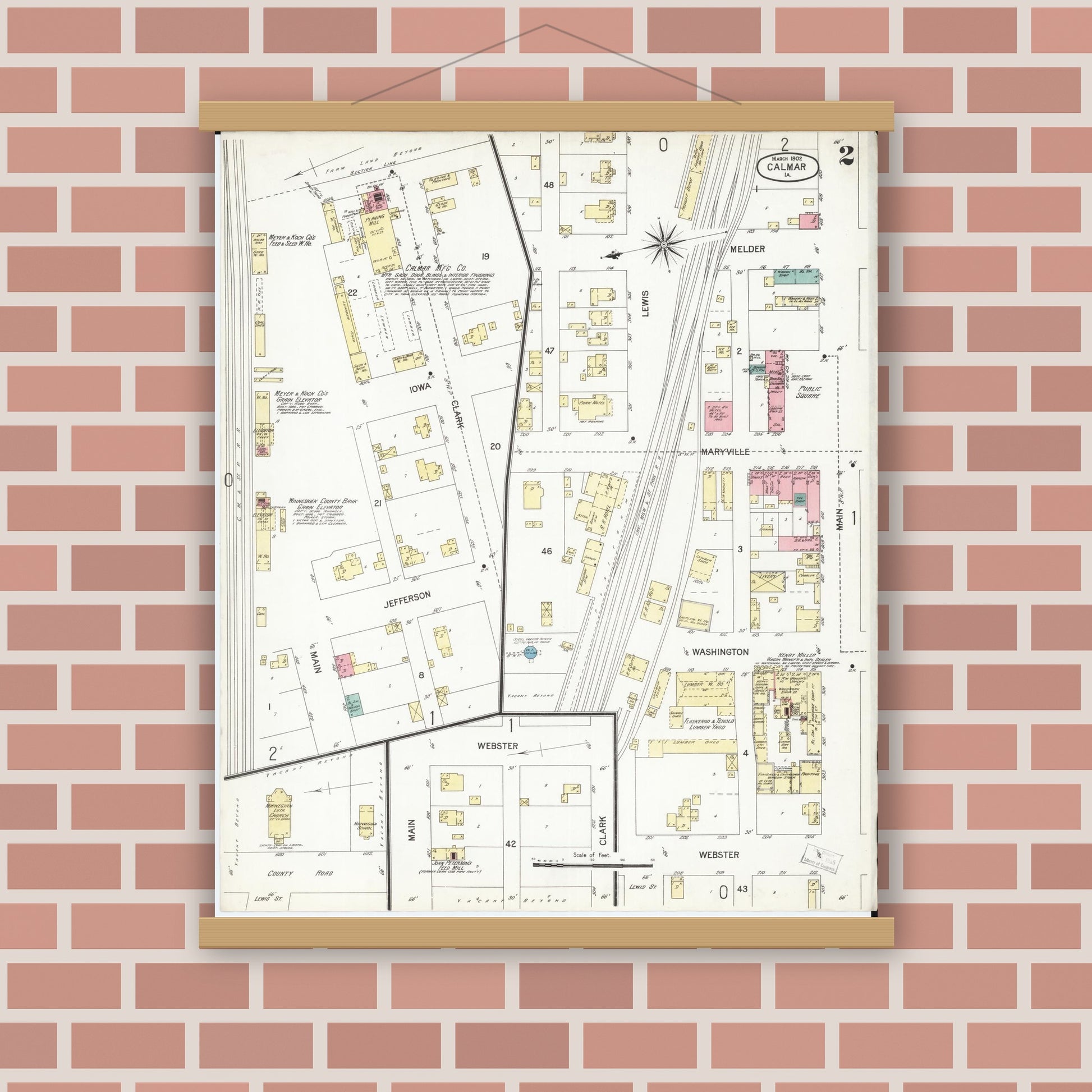 Old map wall art mockup — magnetic wood frame on brick wall — Sanborn Fire Insurance Map from Calmar, Winneshiek County, Iowa (1902), Sheet #0002
