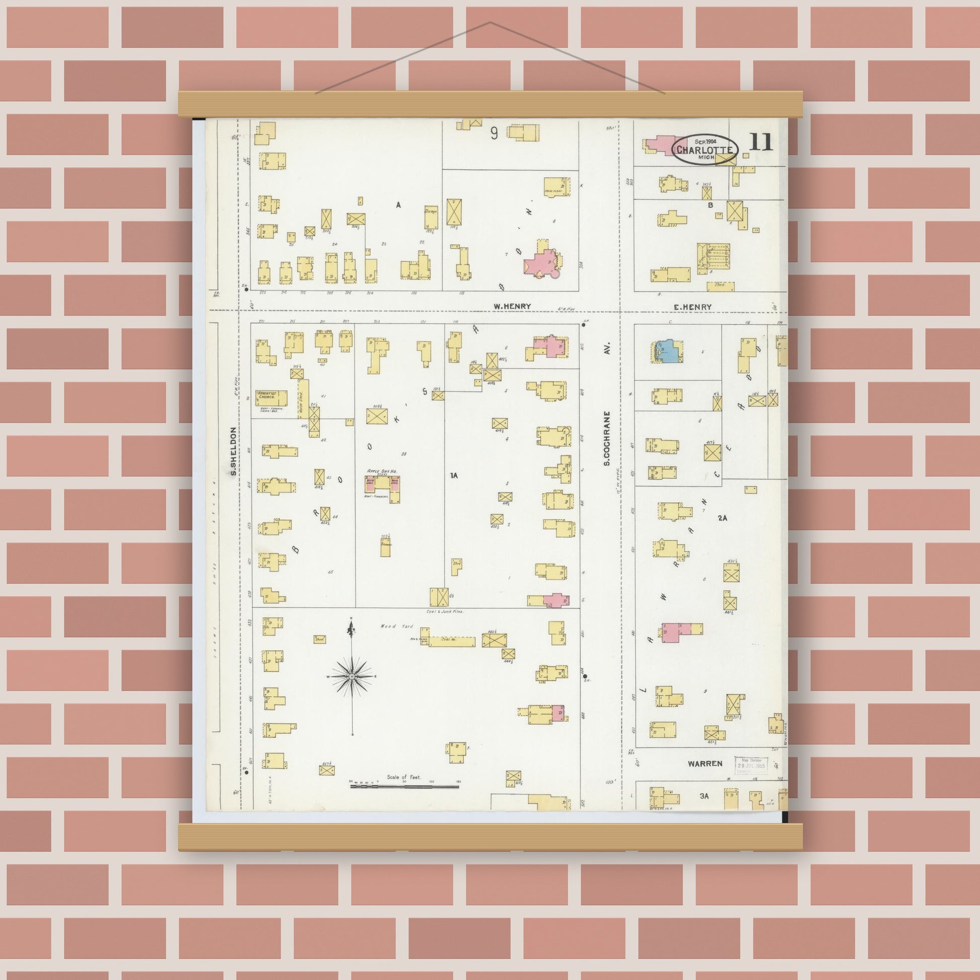 Old map wall art mockup — magnetic wood frame on brick wall — Sanborn Fire Insurance Map from Charlotte, Eaton County, Michigan (1904), Sheet #0011