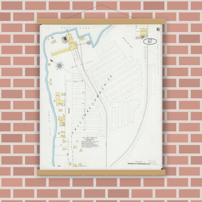 Old map wall art mockup — magnetic wood frame on brick wall — Sanborn Fire Insurance Map from Ely, Saint Louis County, Minnesota (1900), Sheet #0006