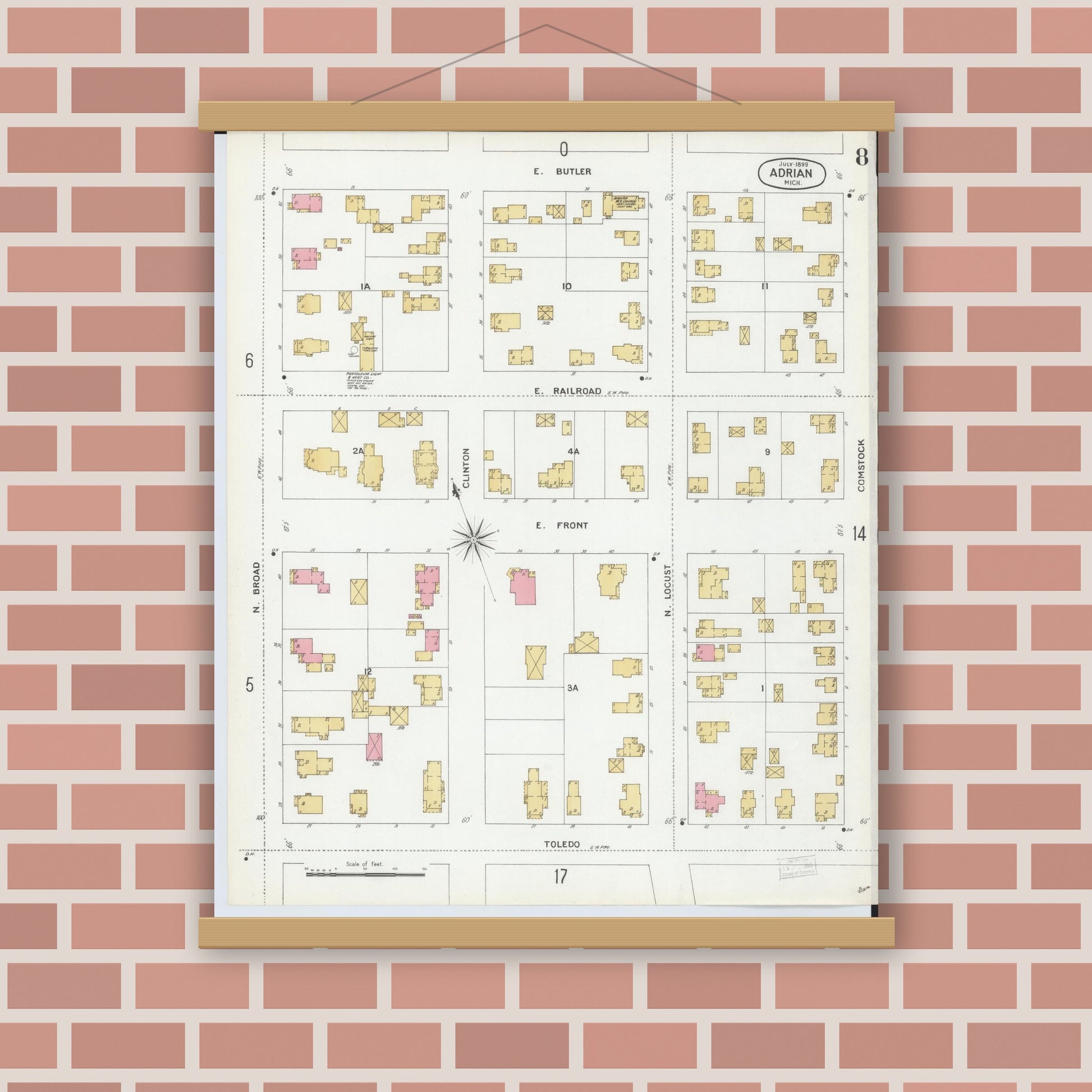 Old map wall art mockup — magnetic wood frame on brick wall — Sanborn Fire Insurance Map from Adrian, Lenawee County, Michigan (1899), Sheet #0008