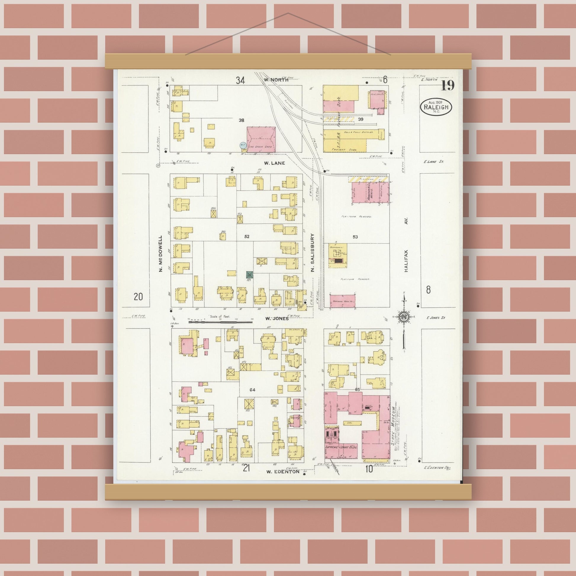 Old map wall art mockup — magnetic wood frame on brick wall — Sanborn Fire Insurance Map from Raleigh, Wake County, North Carolina (1909), Sheet #0019