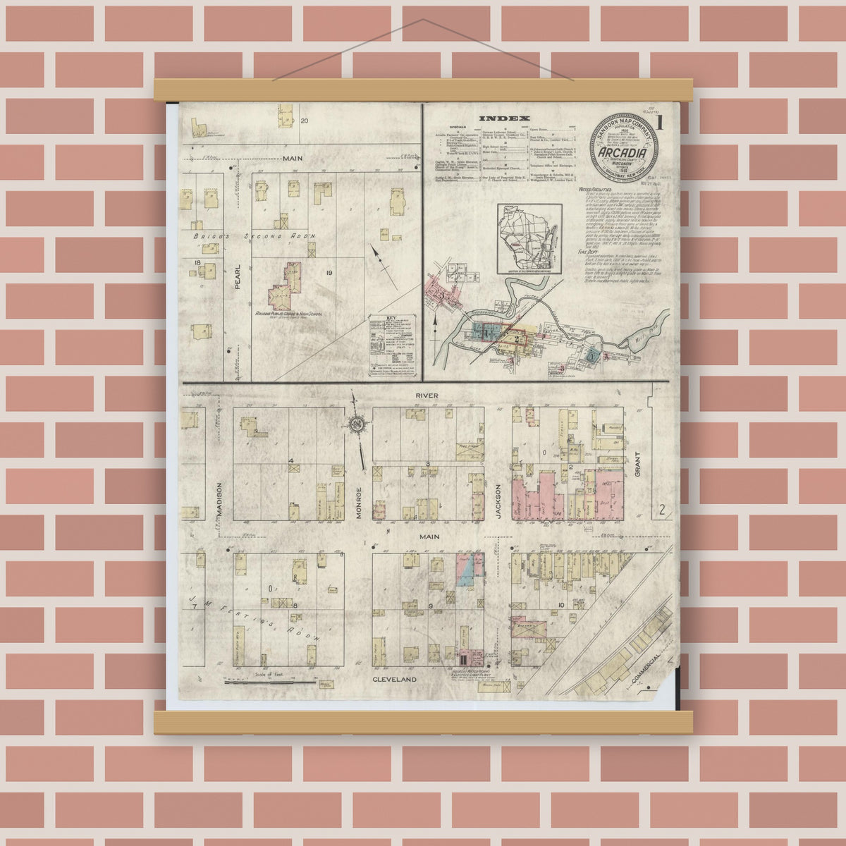 Old map wall art mockup — magnetic wood frame on brick wall — Sanborn Fire Insurance Map from Arcadia, Trempealeau County, Wisconsin (1914), Sheet #0001