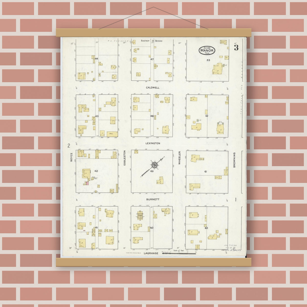 Old map wall art mockup — magnetic wood frame on brick wall — Sanborn Fire Insurance Map from Manor, Travis County, Texas (1916), Sheet #0003