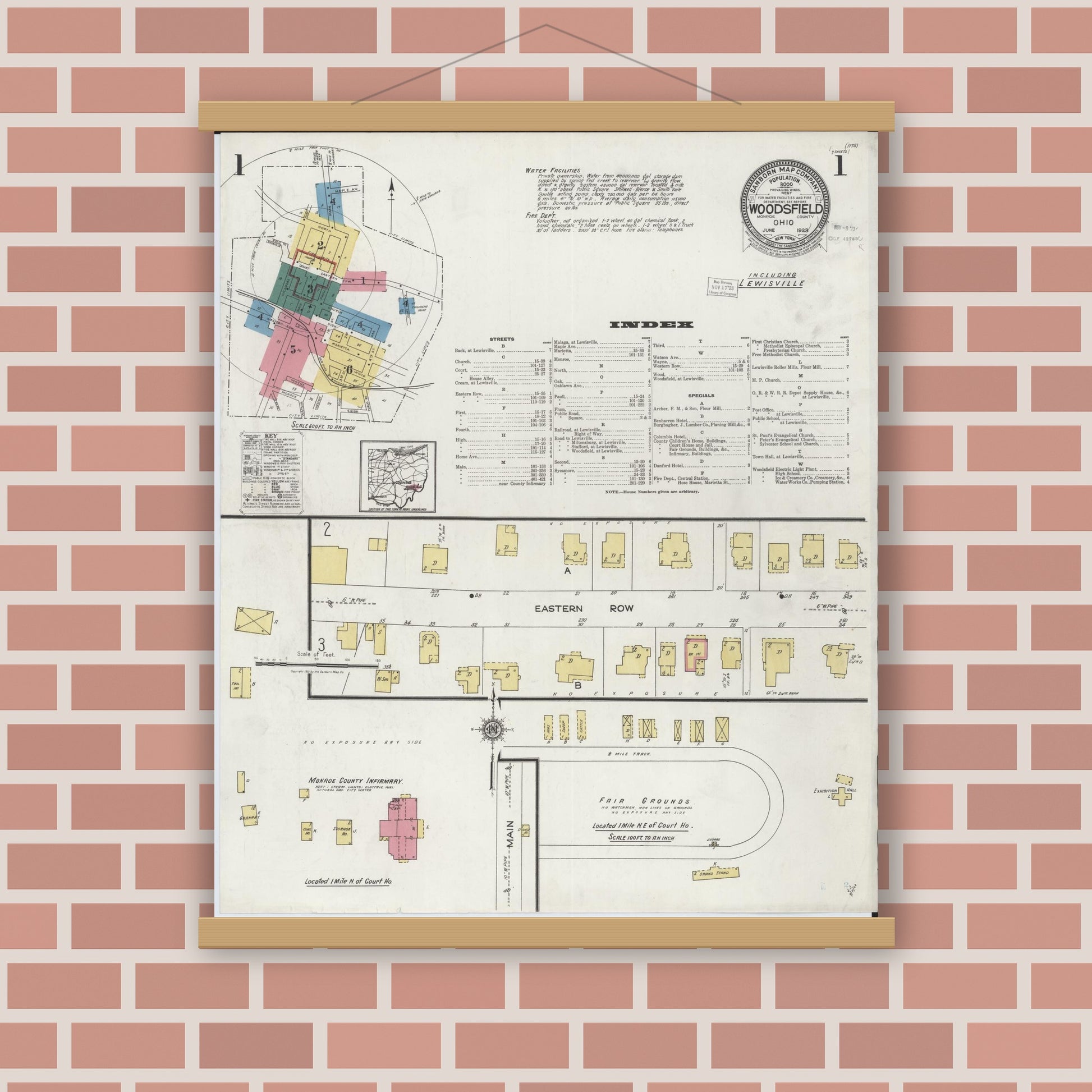 Old map wall art mockup — magnetic wood frame on brick wall — Sanborn Fire Insurance Map from Woodsfield, Monroe County, Ohio (1923) - Complete Map Set