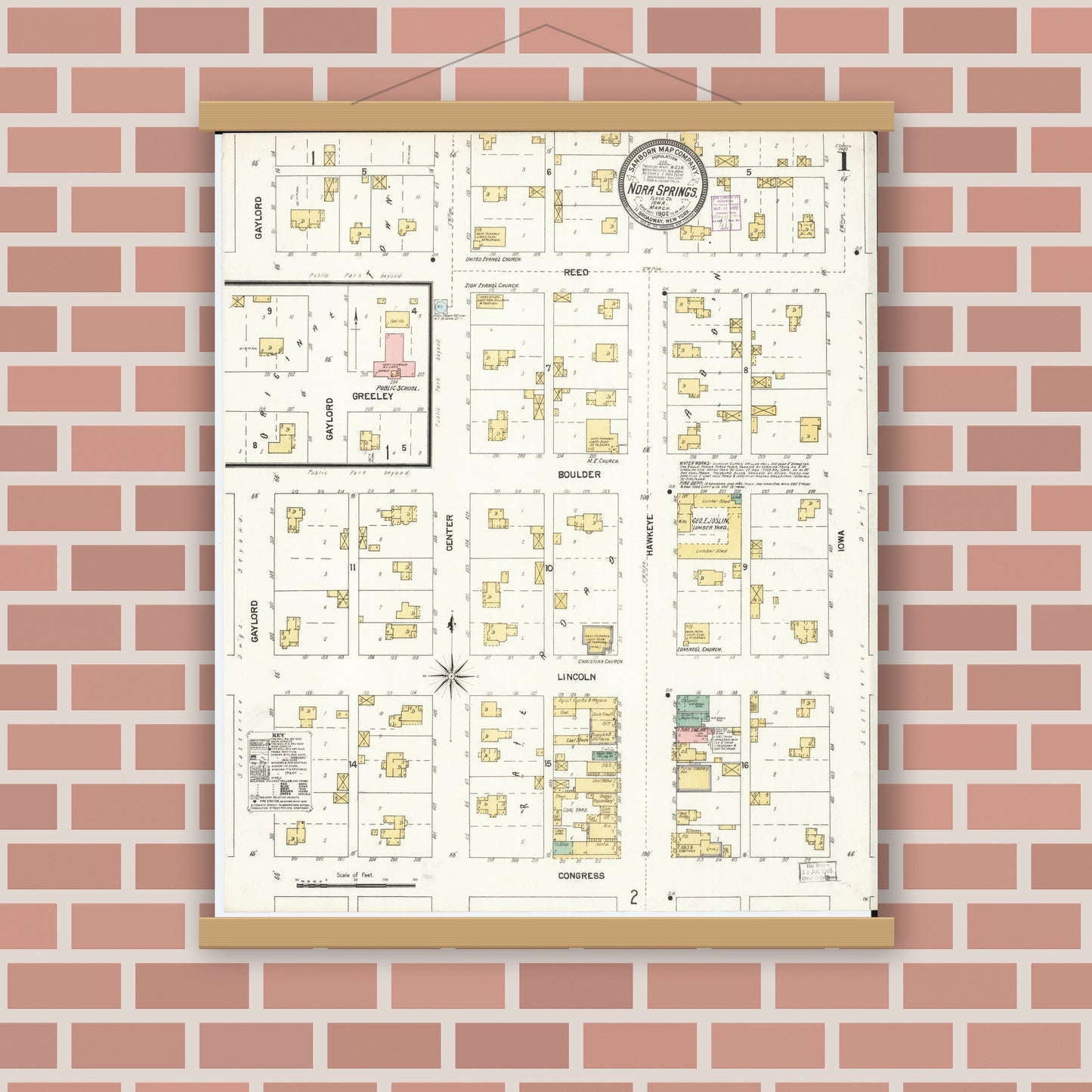 Old map wall art mockup — magnetic wood frame on brick wall — Sanborn Fire Insurance Map from Nora Springs, Floyd County, Iowa (1902) â€” Complete Set