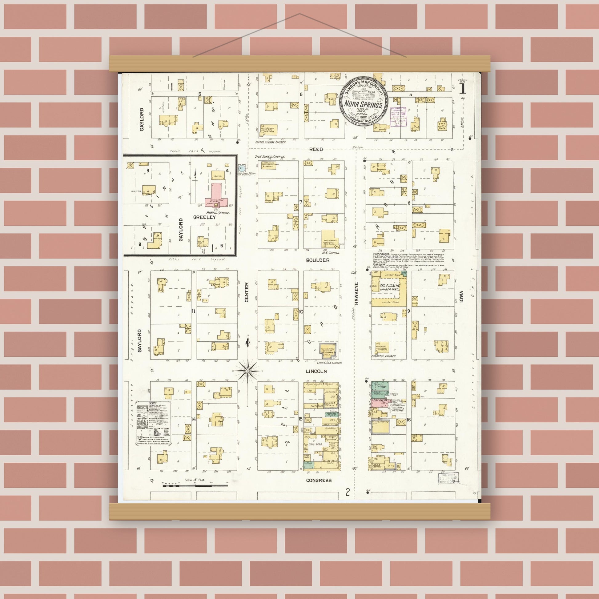 Old map wall art mockup — magnetic wood frame on brick wall — Sanborn Fire Insurance Map from Nora Springs, Floyd County, Iowa (1902) â€” Complete Set