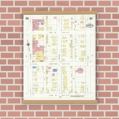 Old map wall art mockup — magnetic wood frame on brick wall — Sanborn Fire Insurance Map from Centralia, Marion, Clinton, Jefferson, and Washington Counties, Illinois (1924), Sheet #0010