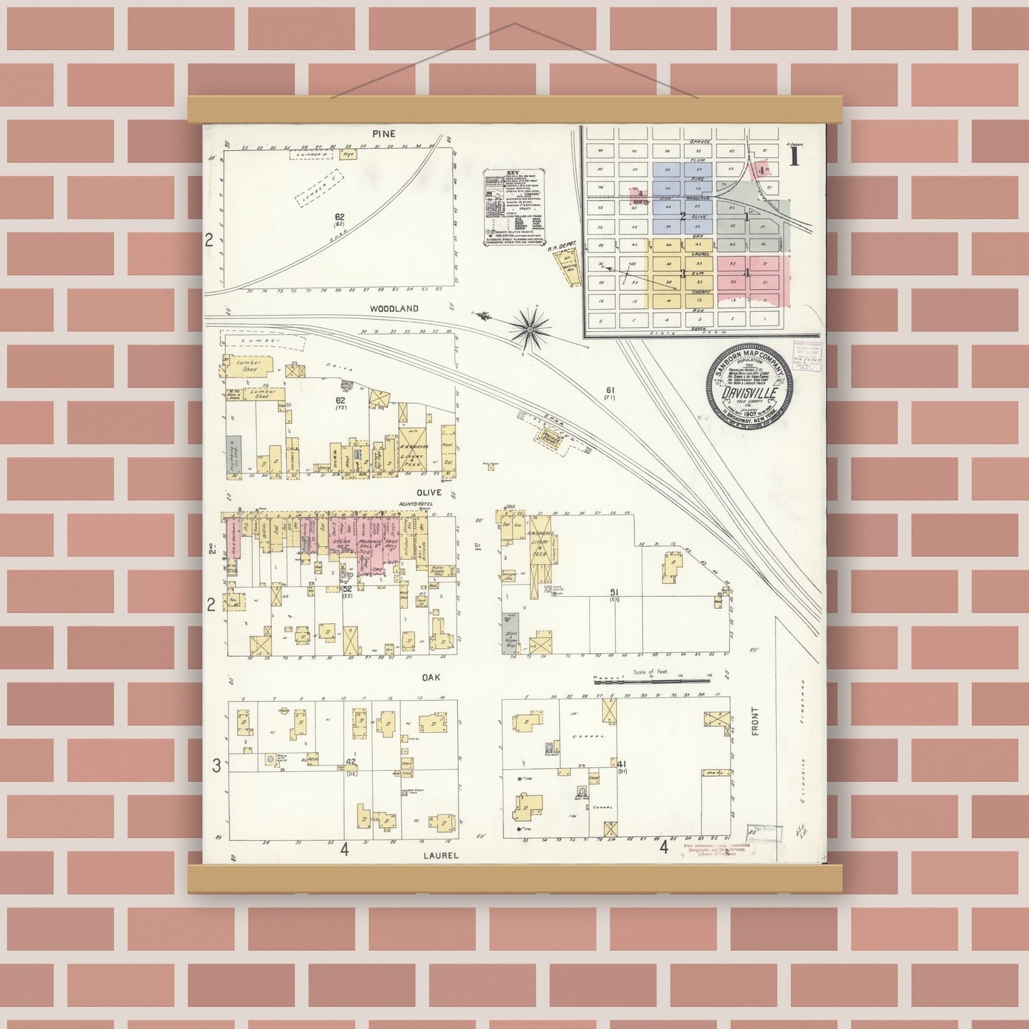 Old map wall art mockup — magnetic wood frame on brick wall — Sanborn Fire Insurance Map from Davis, Yolo County, California (1907), Sheet #0001