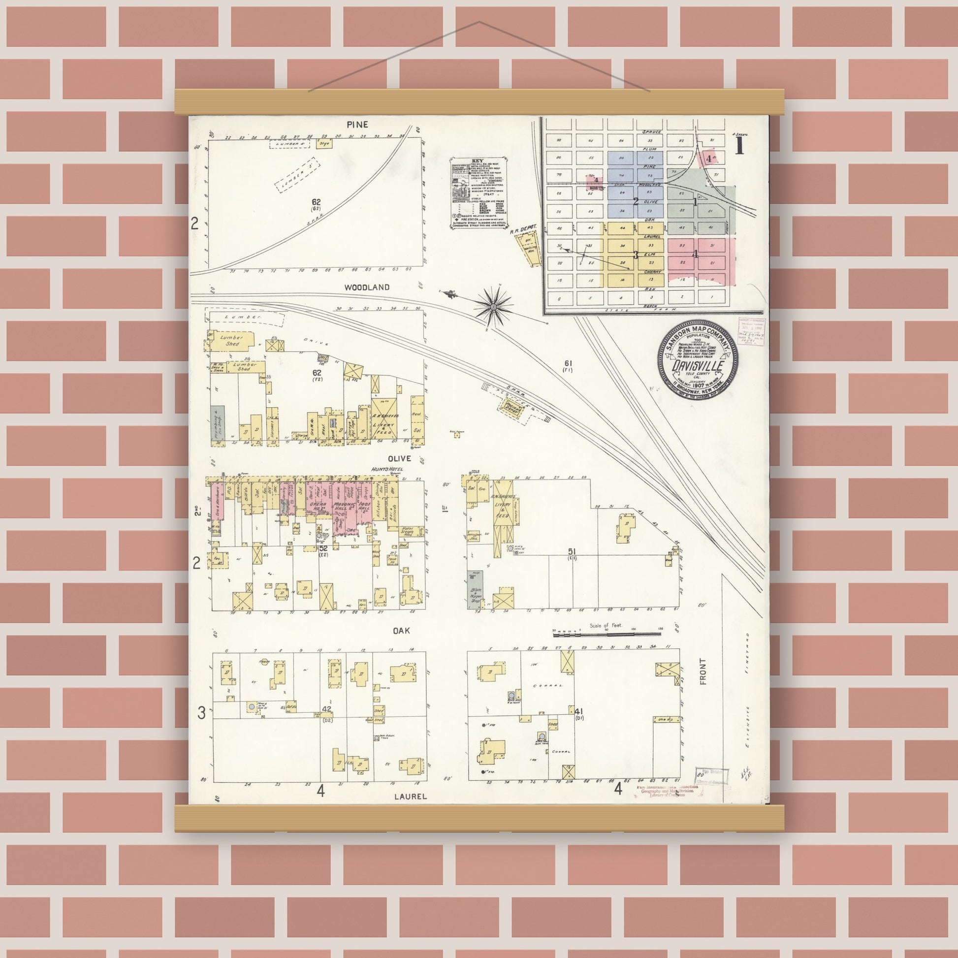 Old map wall art mockup — magnetic wood frame on brick wall — Sanborn Fire Insurance Map from Davis, Yolo County, California (1907), Sheet #0001