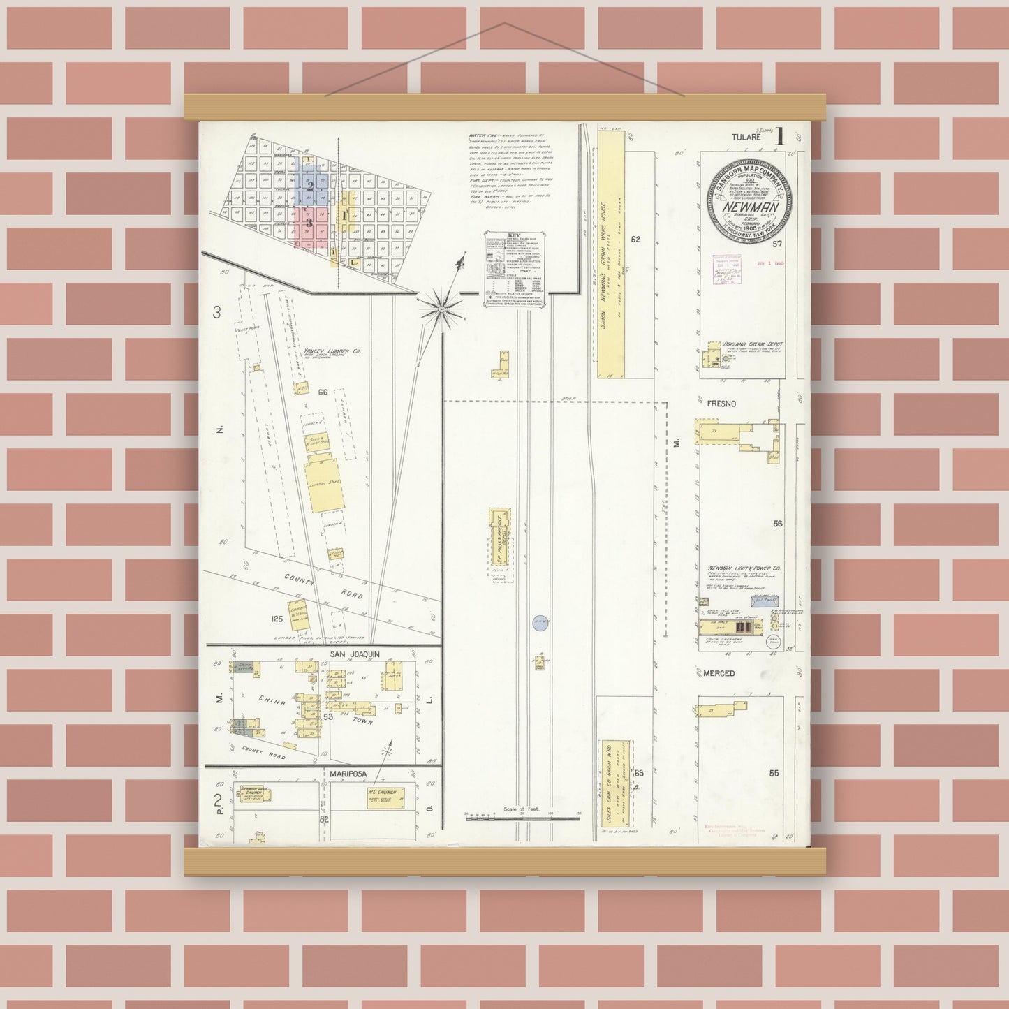Old map wall art mockup — magnetic wood frame on brick wall — Sanborn Fire Insurance Map from Newman, Stanislaus County, California (1908) - Complete Map Set