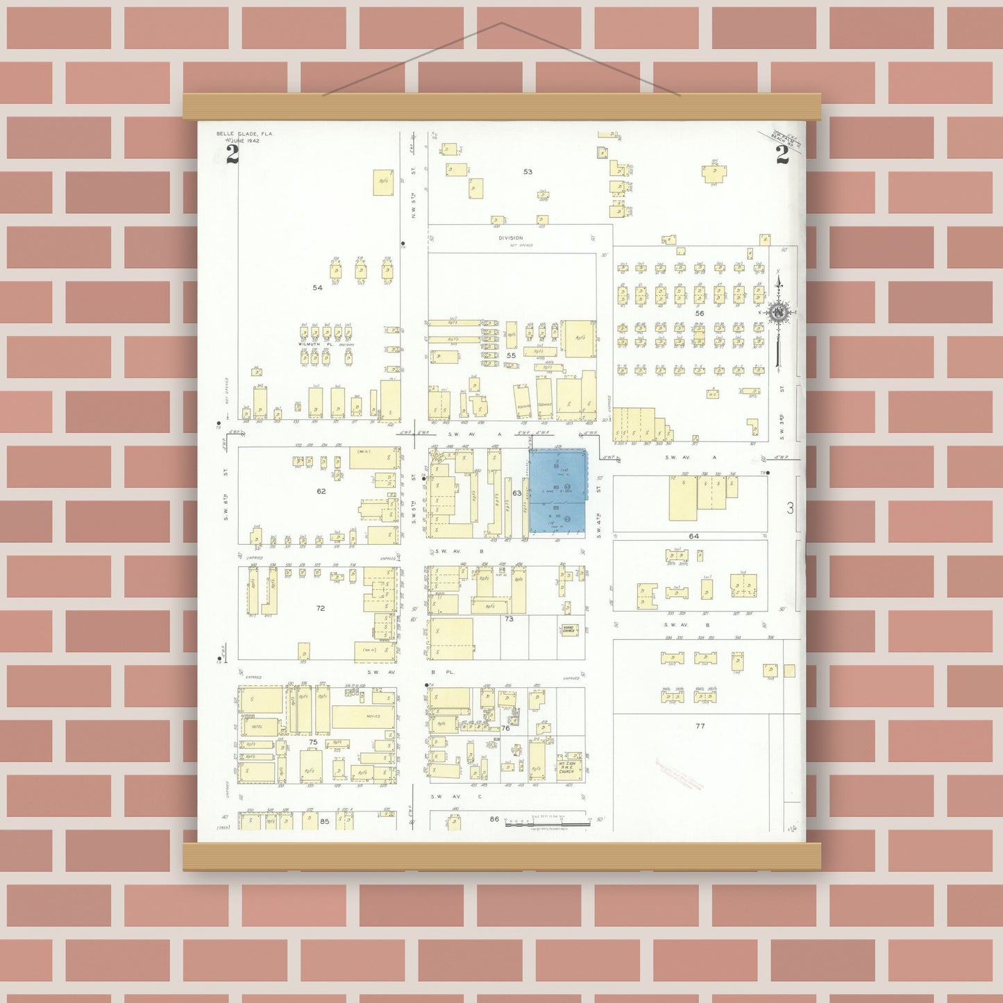 Old map wall art mockup — magnetic wood frame on brick wall — Sanborn Fire Insurance Map from Belle Glade, Palm Beach County, Florida (1942), Sheet #0002