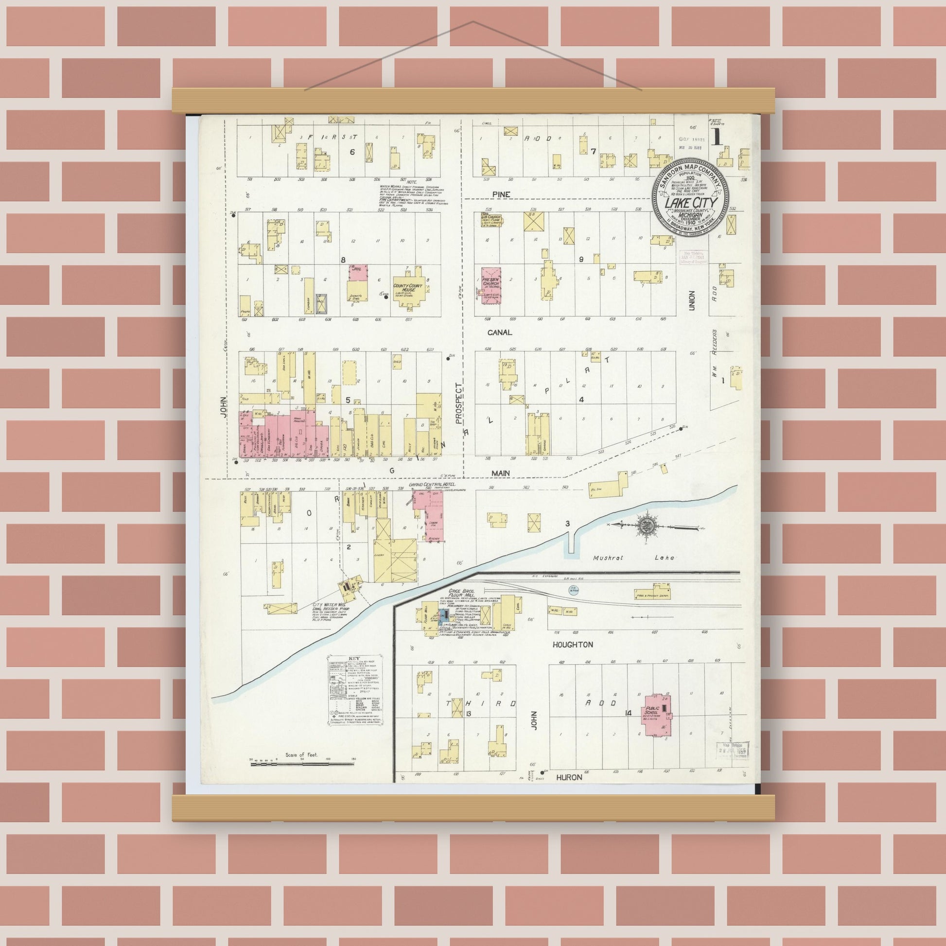 Old map wall art mockup — magnetic wood frame on brick wall — Sanborn Fire Insurance Map from Lake City, Missaukee County, Michigan (1910) - Complete Map Set