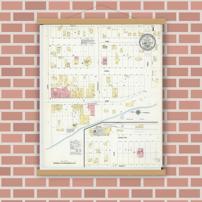 Old map wall art mockup — magnetic wood frame on brick wall — Sanborn Fire Insurance Map from Lake City, Missaukee County, Michigan (1910) - Complete Map Set