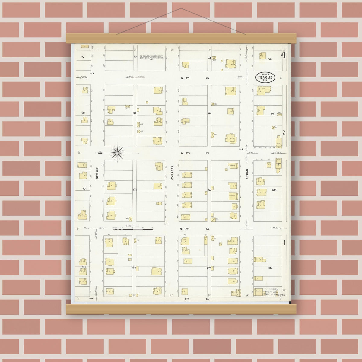 Old map wall art mockup — magnetic wood frame on brick wall — Sanborn Fire Insurance Map from Teague, Freestone County, Texas (1908), Sheet #0004