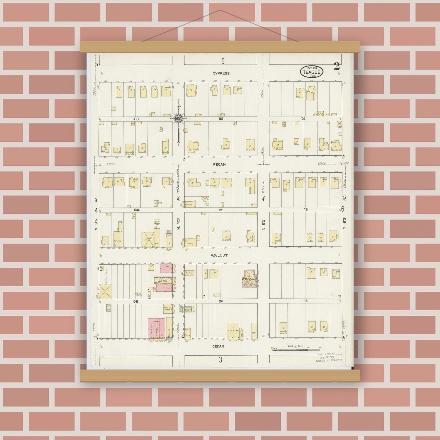 Old map wall art mockup — magnetic wood frame on brick wall — Sanborn Fire Insurance Map from Teague, Freestone County, Texas (1914), Sheet #0002