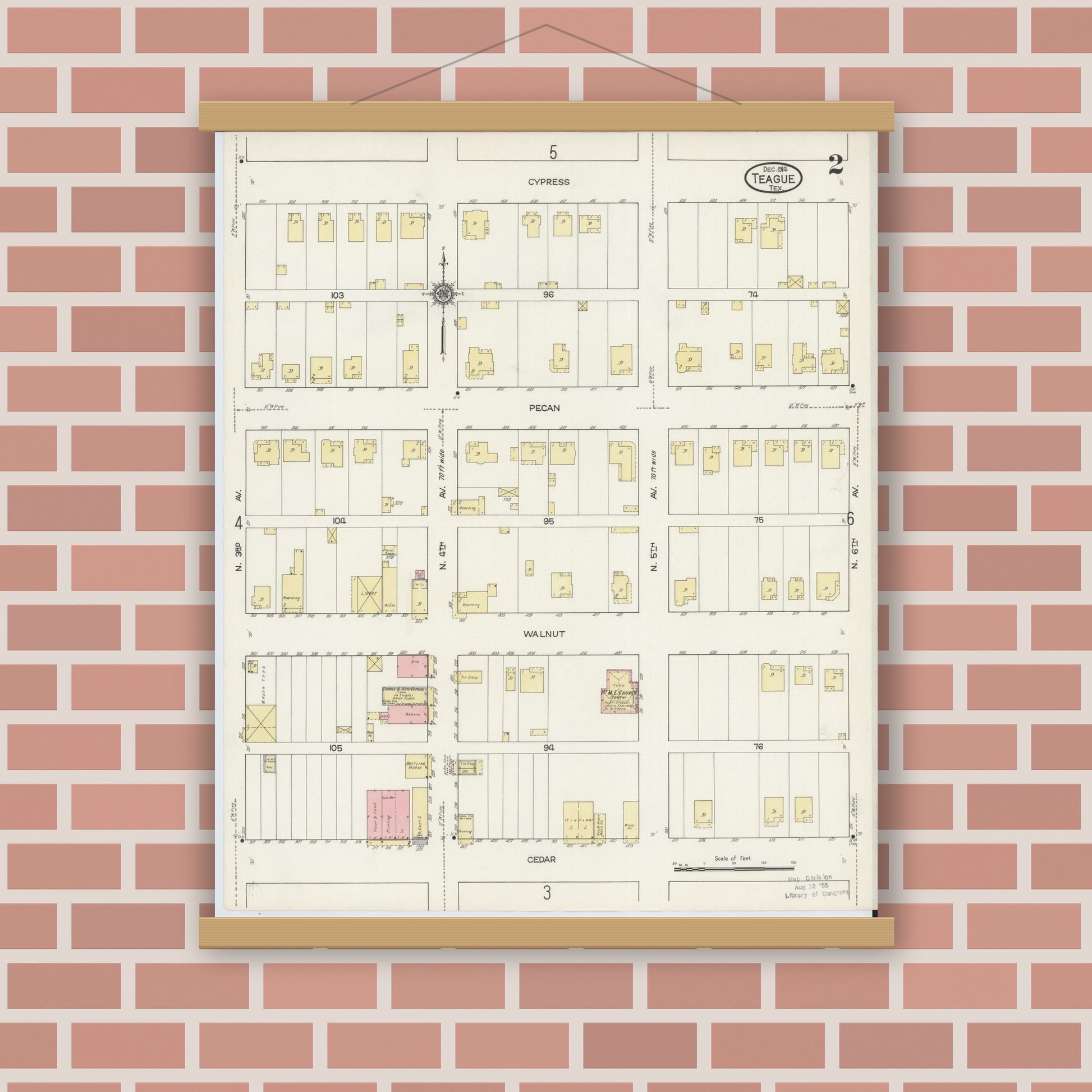 Old map wall art mockup — magnetic wood frame on brick wall — Sanborn Fire Insurance Map from Teague, Freestone County, Texas (1914), Sheet #0002