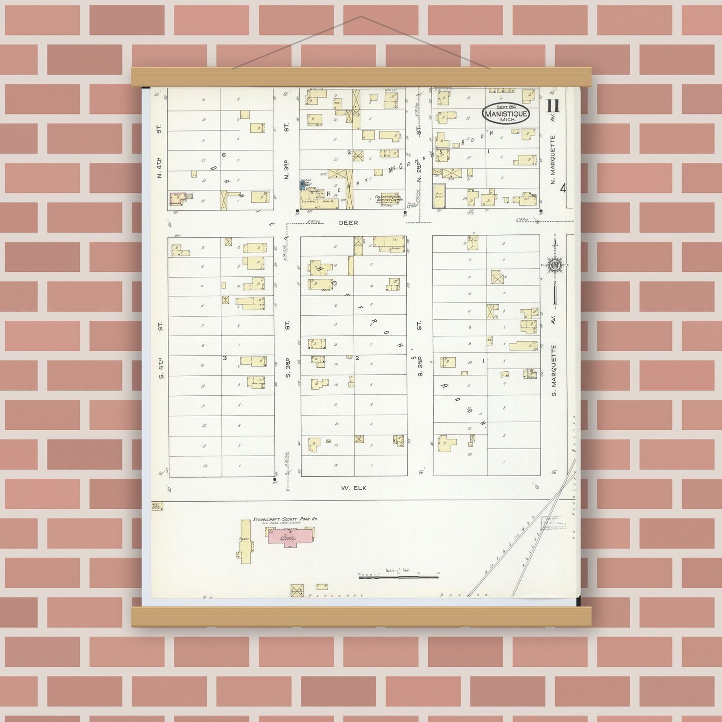 Old map wall art mockup — magnetic wood frame on brick wall — Sanborn Fire Insurance Map from Manistique, Schoolcraft County, Michigan (1914), Sheet #0011