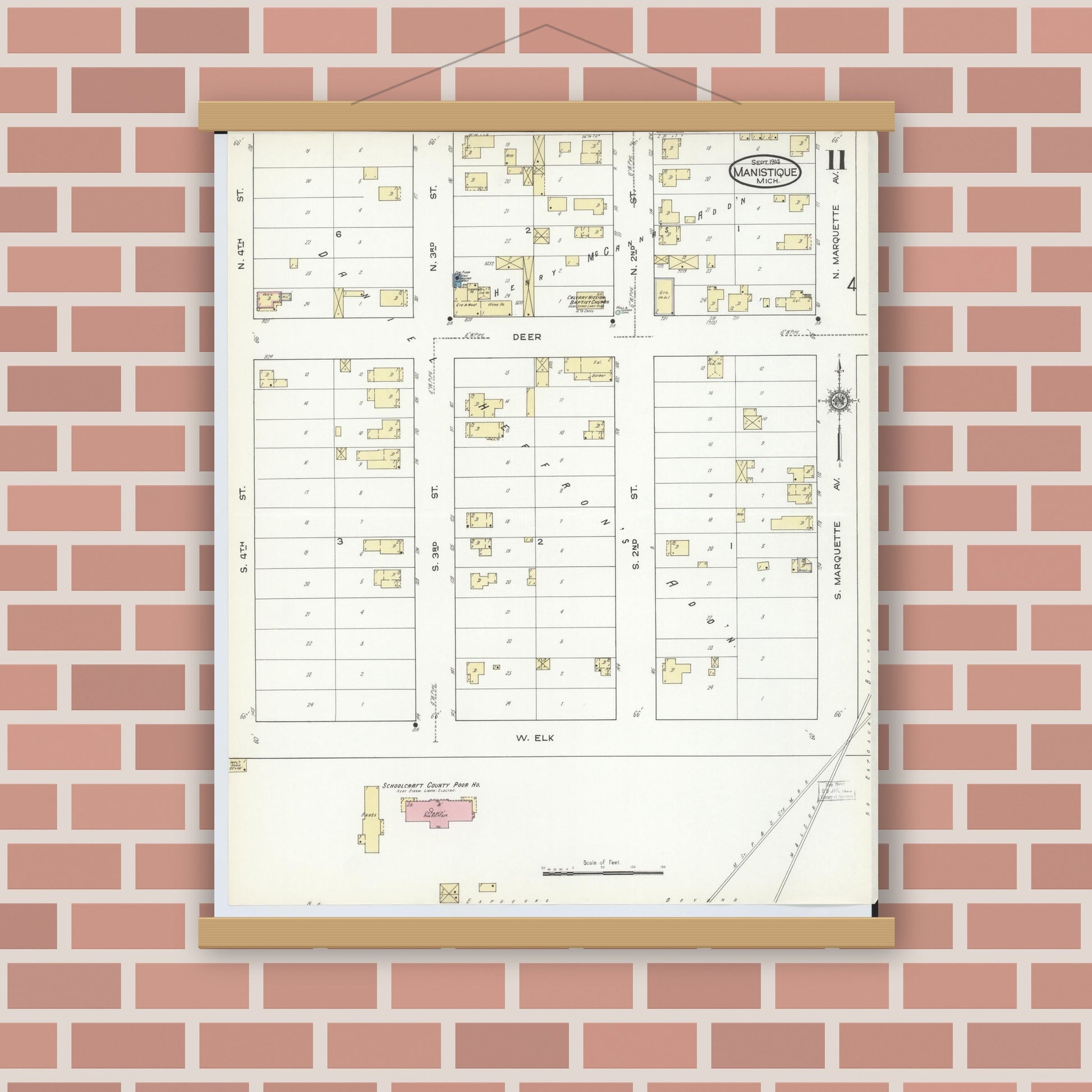 Old map wall art mockup — magnetic wood frame on brick wall — Sanborn Fire Insurance Map from Manistique, Schoolcraft County, Michigan (1914), Sheet #0011