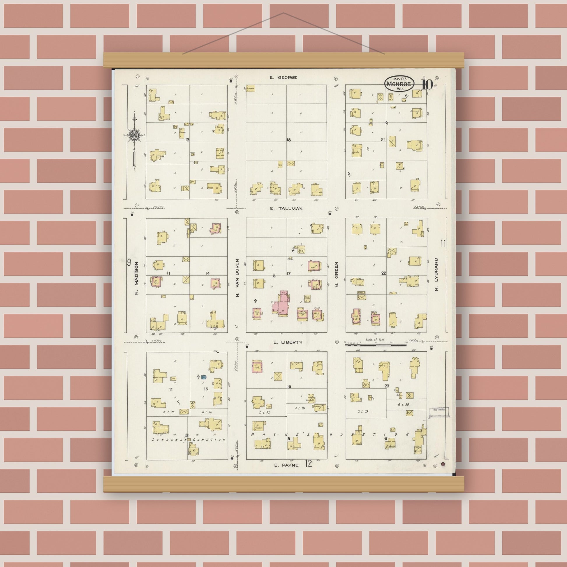 Old map wall art mockup — magnetic wood frame on brick wall — Sanborn Fire Insurance Map from Monroe, Green County, Wisconsin (1915), Sheet #0010