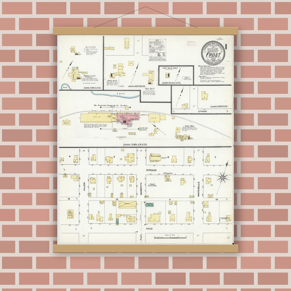 Old map wall art mockup — magnetic wood frame on brick wall — Sanborn Fire Insurance Map from Frost, Navarro County, Texas (1909) - Complete Map Set