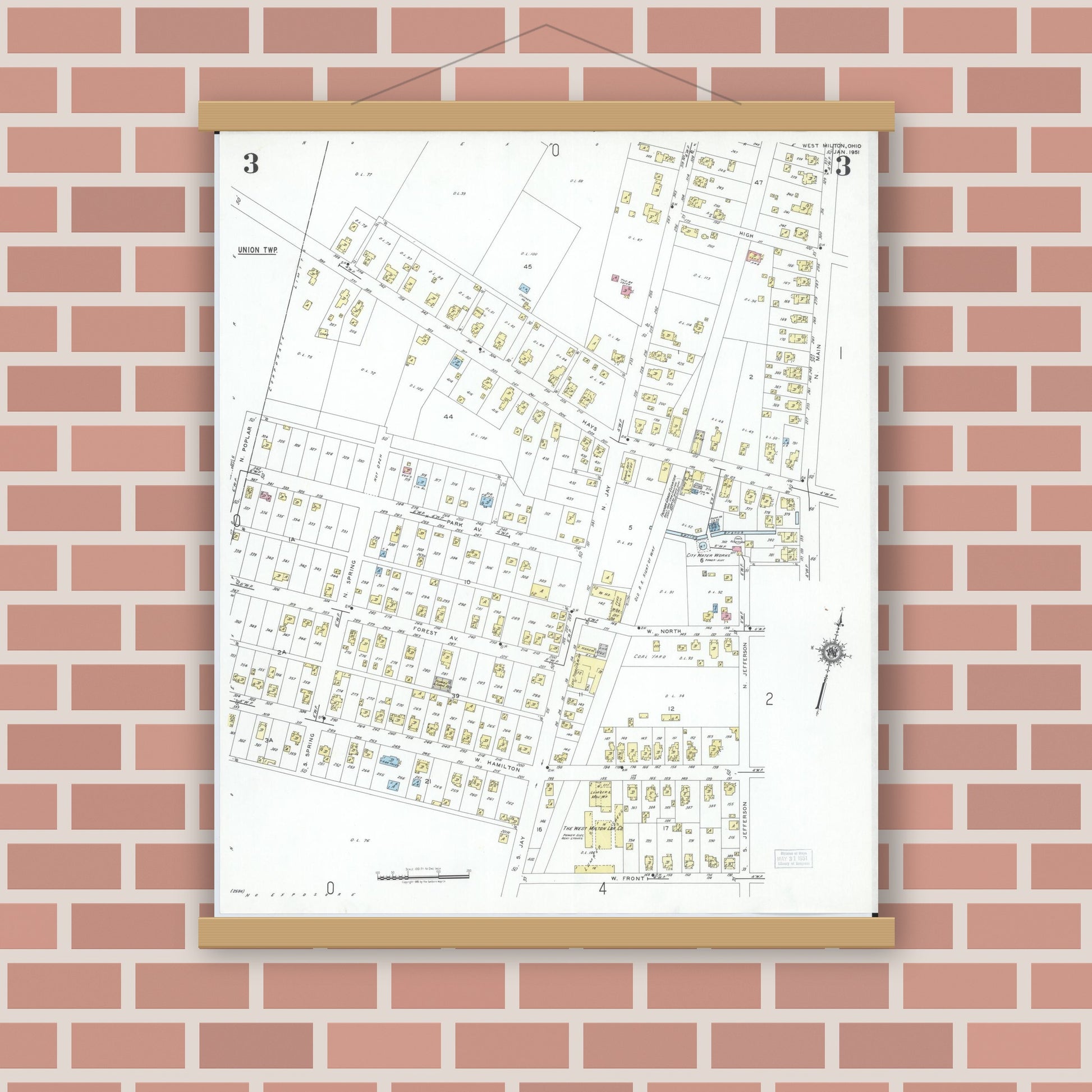 Old map wall art mockup — magnetic wood frame on brick wall — Sanborn Fire Insurance Map from West Milton, Miami County, Ohio (1951), Sheet #0003