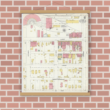 Old map wall art mockup — magnetic wood frame on brick wall — Sanborn Fire Insurance Map from Centralia, Marion, Clinton, Jefferson, and Washington Counties, Illinois (1902), Sheet #0002