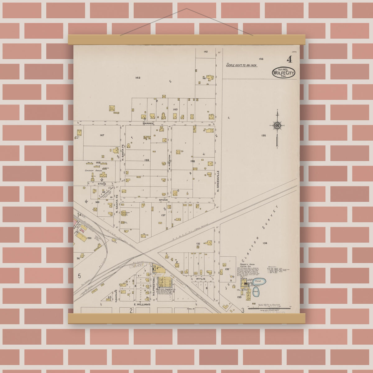 Old map wall art mockup — magnetic wood frame on brick wall — Sanborn Fire Insurance Map from Wolfe City, Hunt County, Texas (1922), Sheet #0004