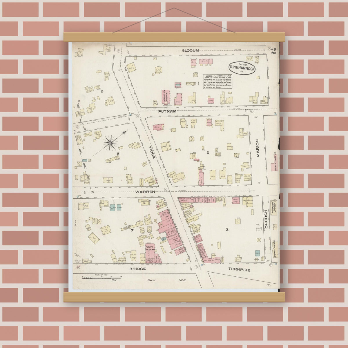 Old map wall art mockup — magnetic wood frame on brick wall — Sanborn Fire Insurance Map from Tunkhannock, Wyoming County, Pennsylvania (1884), Sheet #0002