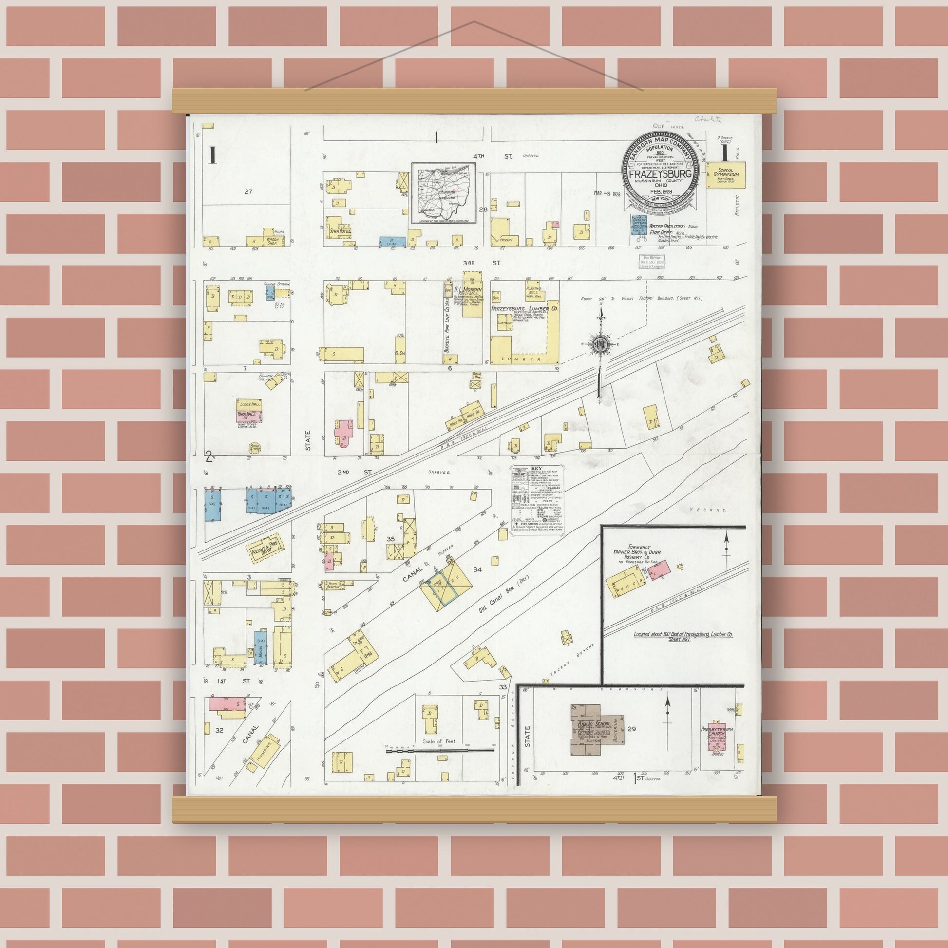 Old map wall art mockup — magnetic wood frame on brick wall — Sanborn Fire Insurance Map from Frazeysburg, Muskingum County, Ohio (1928), Sheet #0001
