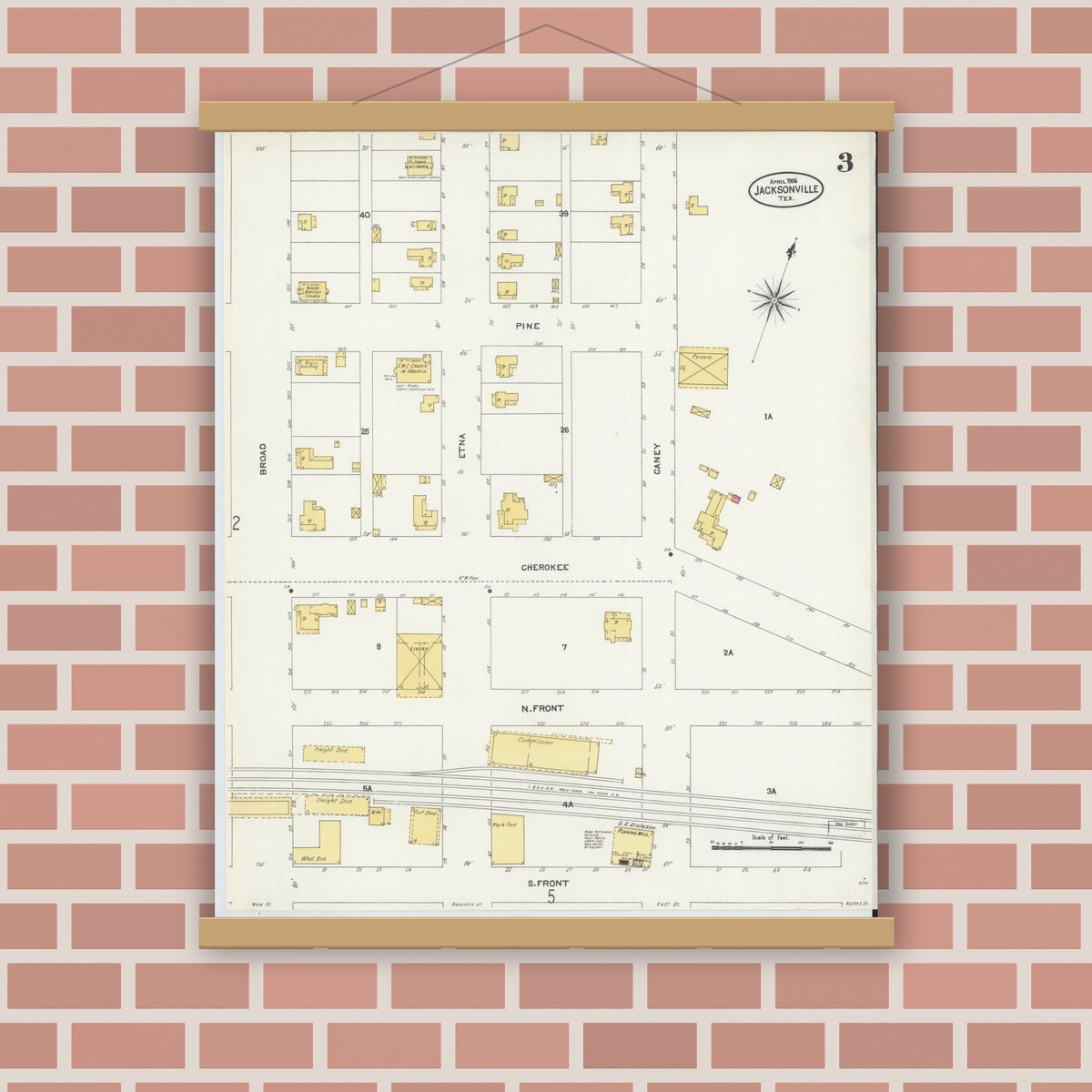 Old map wall art mockup — magnetic wood frame on brick wall — Sanborn Fire Insurance Map from Jacksonville, Cherokee County, Texas (1906), Sheet #0003