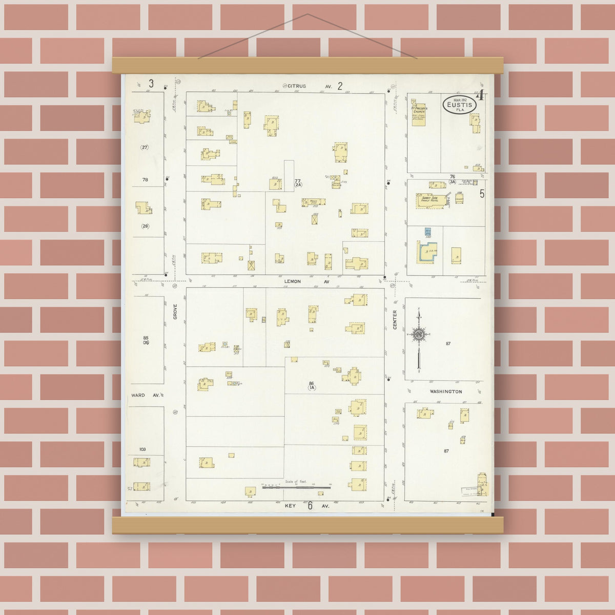 Old map wall art mockup — magnetic wood frame on brick wall — Sanborn Fire Insurance Map from Eustis, Lake County, Florida (1912), Sheet #0004