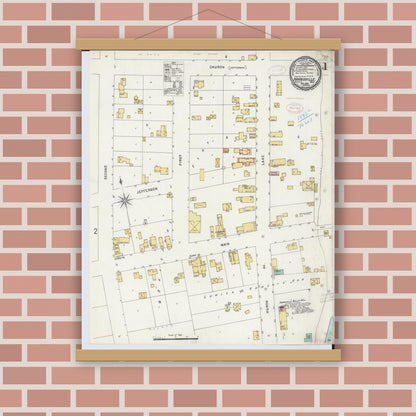 Old map wall art mockup — magnetic wood frame on brick wall — Sanborn Fire Insurance Map from Harrisville, Alcona County, Michigan (1898), Sheet #0001