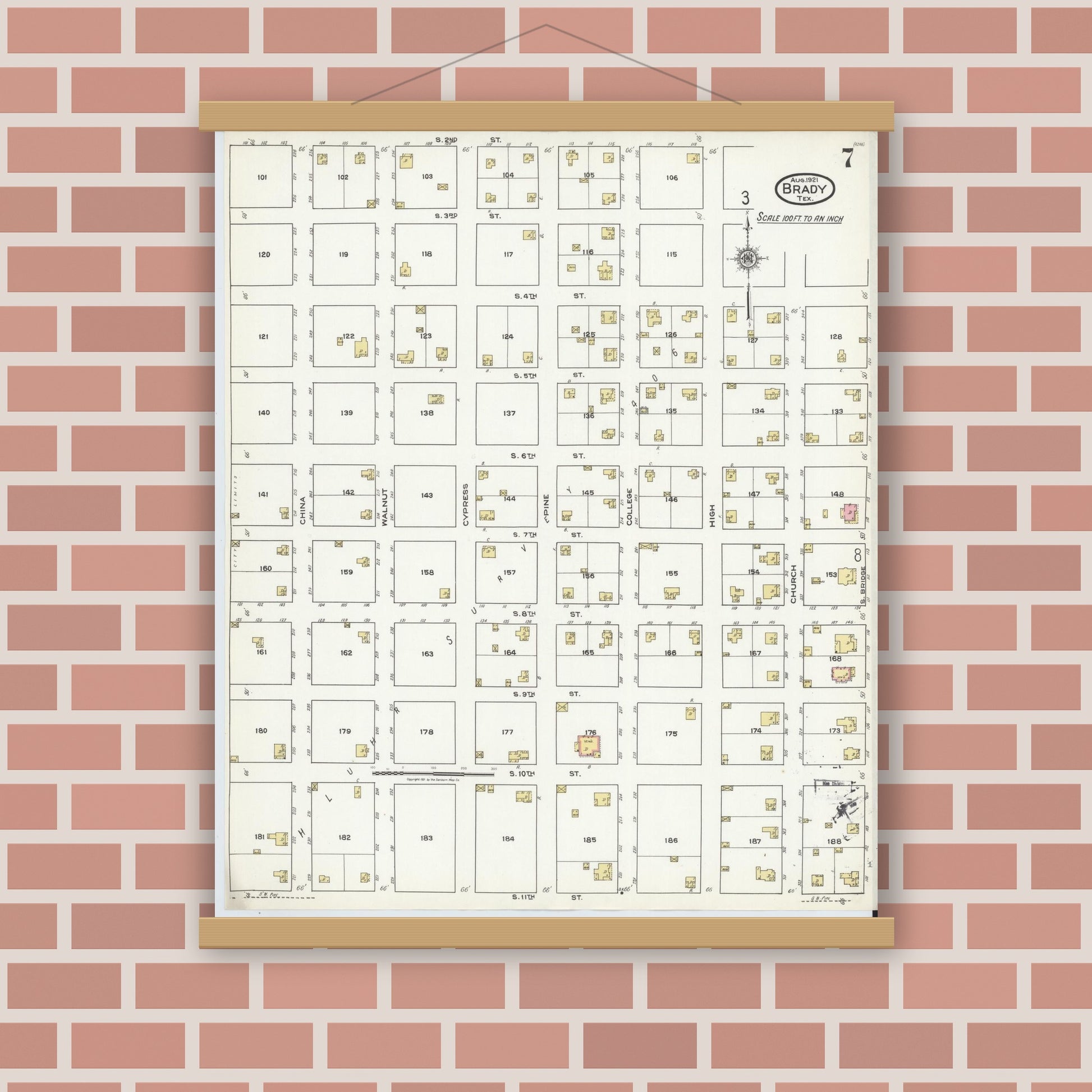 Old map wall art mockup — magnetic wood frame on brick wall — Sanborn Fire Insurance Map from Brady, McCulloch County, Texas (1921), Sheet #0007