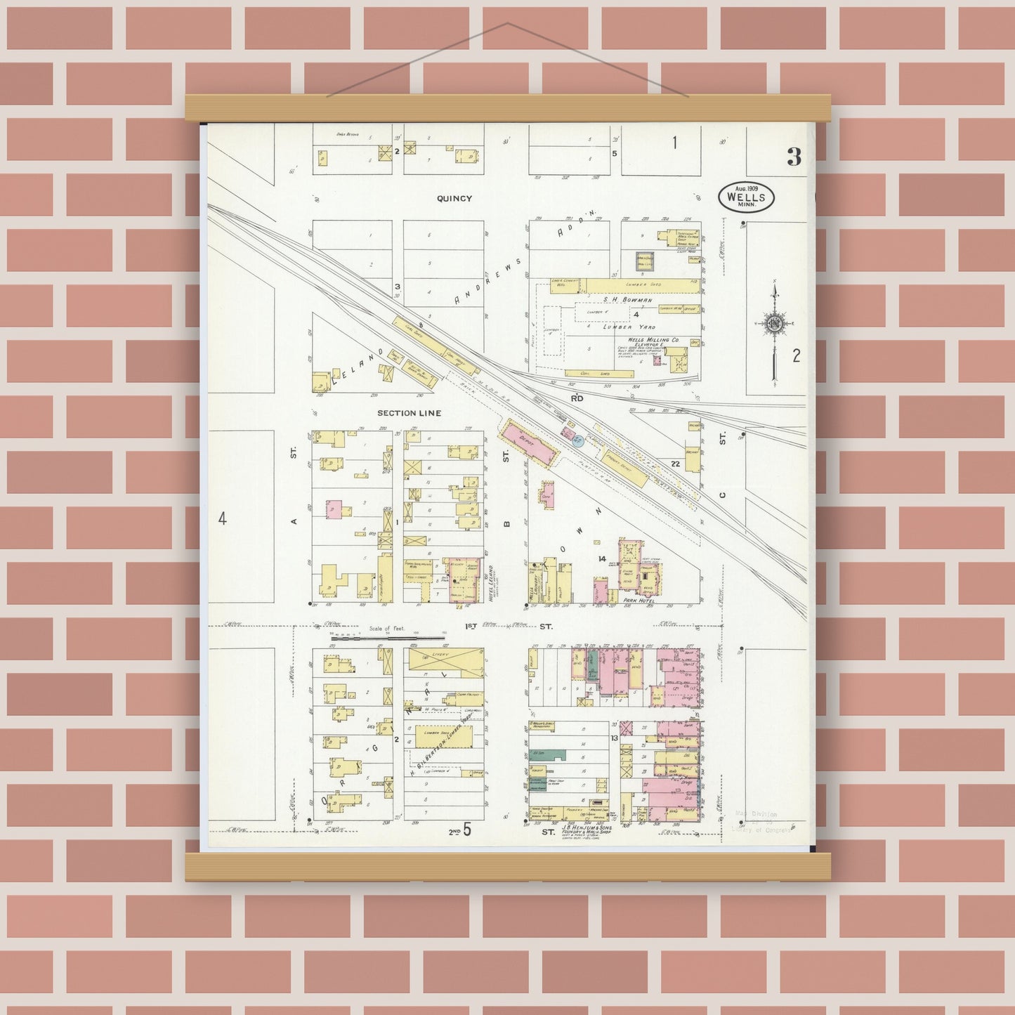 Old map wall art mockup — magnetic wood frame on brick wall — Sanborn Fire Insurance Map from Wells, Faribault County, Minnesota (1909), Sheet #0003