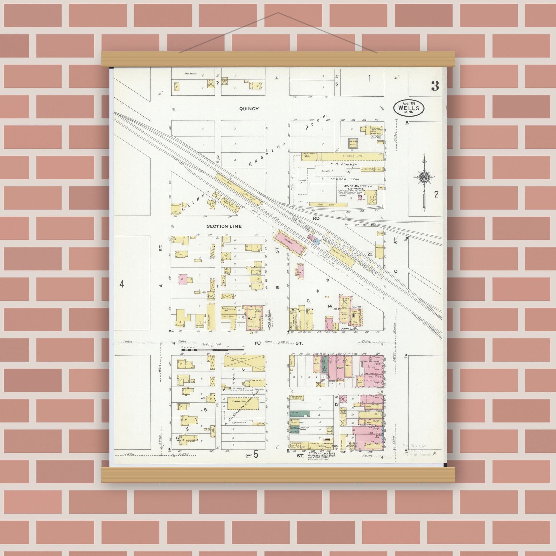 Old map wall art mockup — magnetic wood frame on brick wall — Sanborn Fire Insurance Map from Wells, Faribault County, Minnesota (1909), Sheet #0003